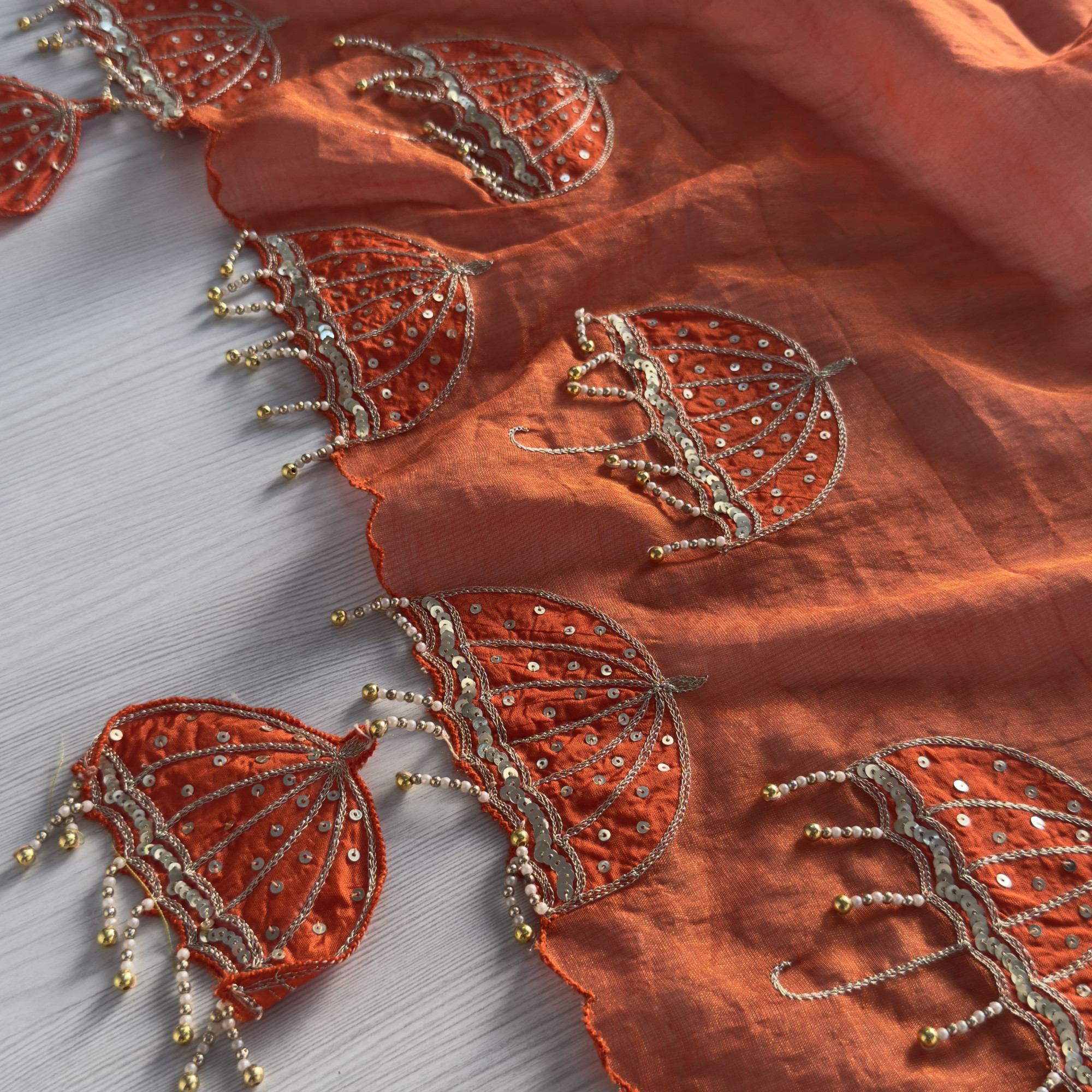 Rust Orange Hand-Embroidered Tissue Chanderi Saree