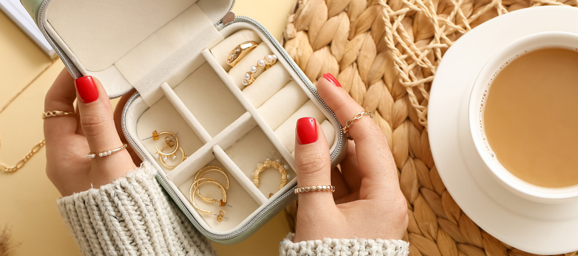 Pearl Rings and pearl earrings in box on coffee table