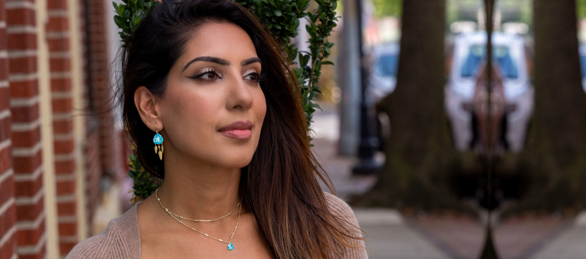 wearing Paraiba Tourmaline by the girl