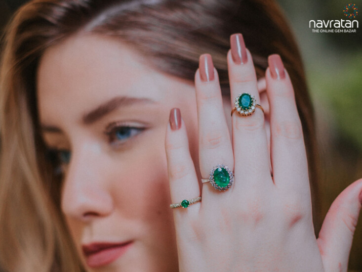 three types of emerald ring on the girl finger