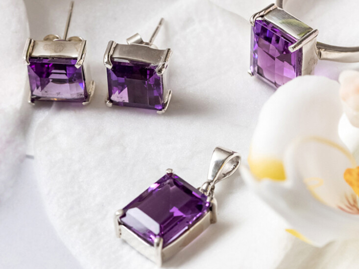 Amethyst Stone ring pendant and earring on the white background