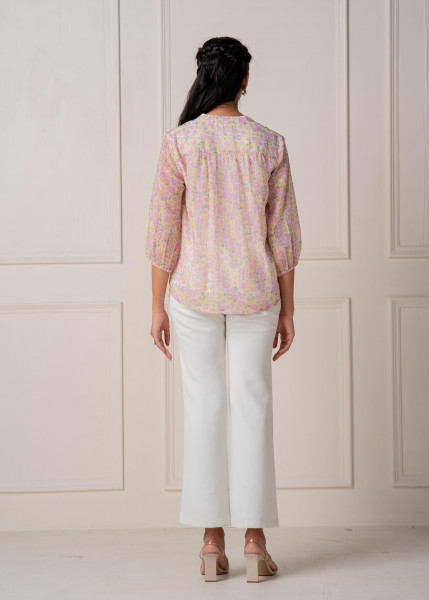 Lamora Pastel Floral Tie-Neck Peasant Top with Tassels