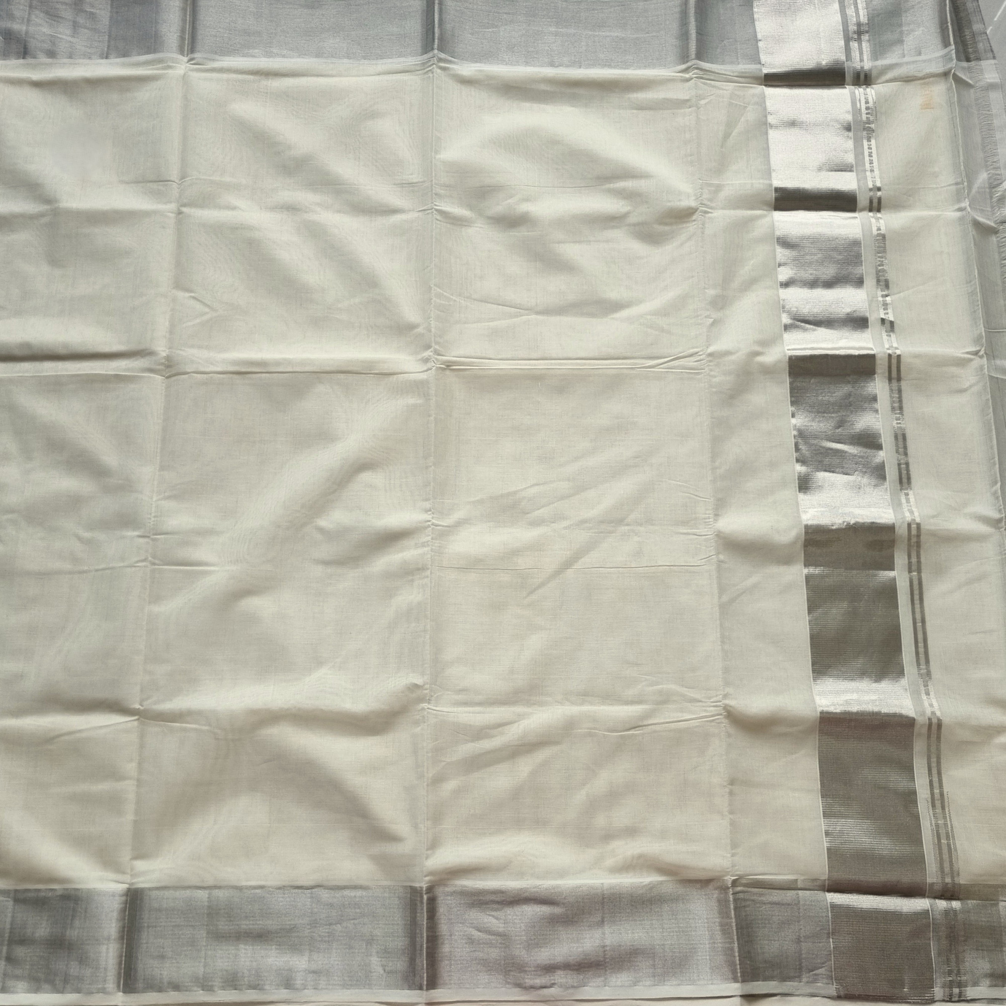 Kerala cotton Kasavu with silver colored borders
