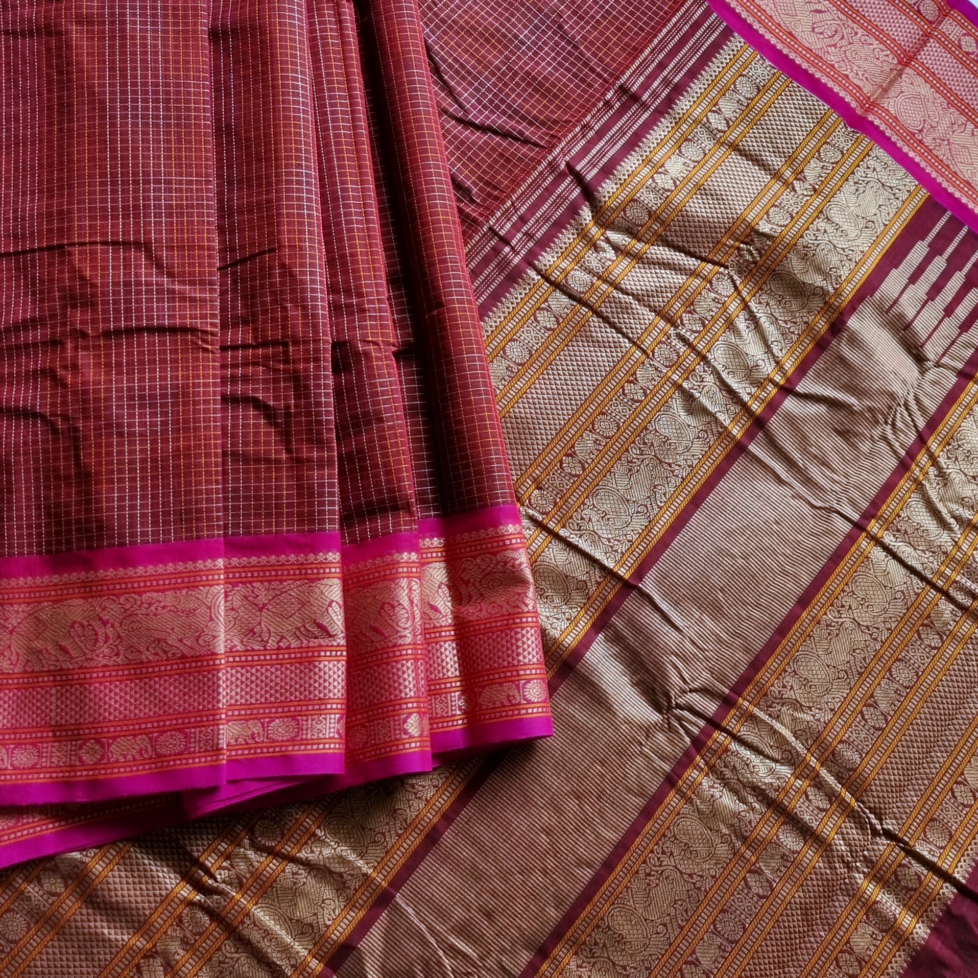 Kanchi Cotton maroonish brown checked saree with intricate borders
