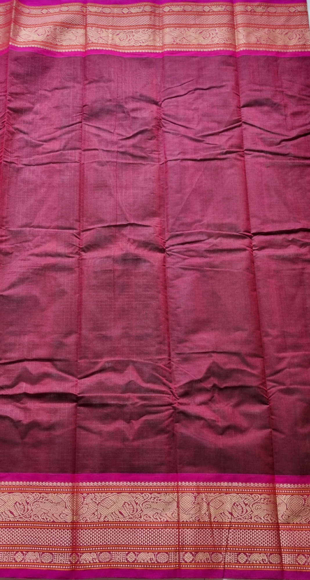 Kanchi Cotton maroonish brown checked saree with intricate borders