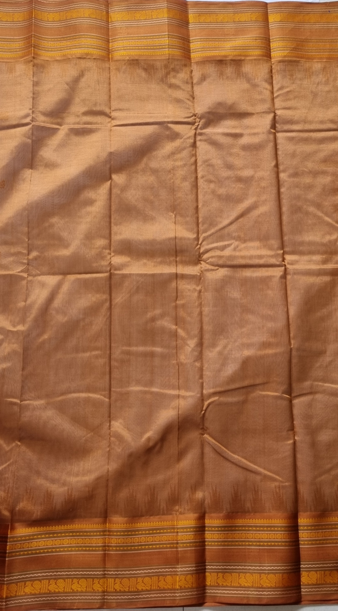 Kanchi Cotton body offwhite with bronze Korvai Silk Borders