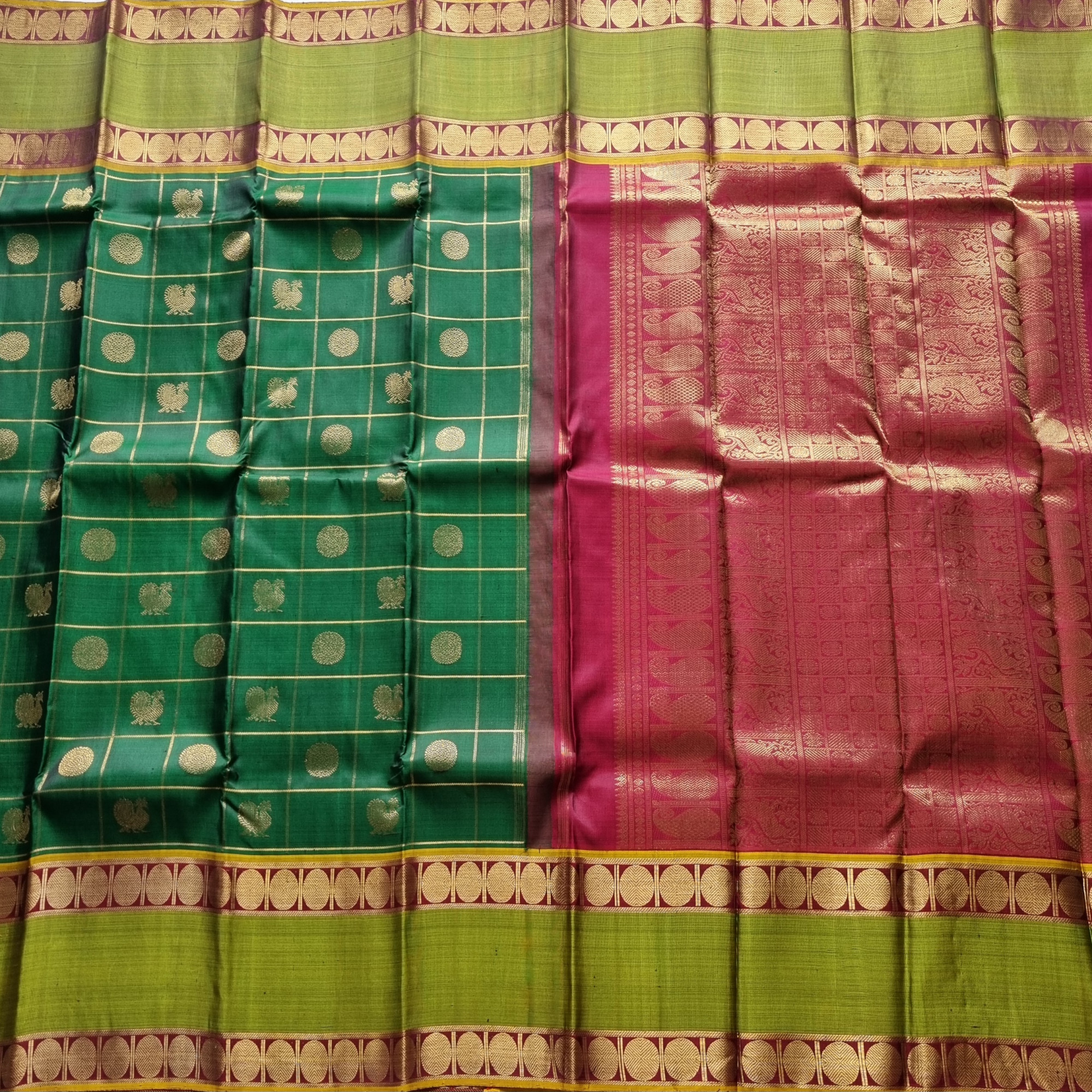 Kanjivaram Silk gorgeous dark green Mayil Chakram