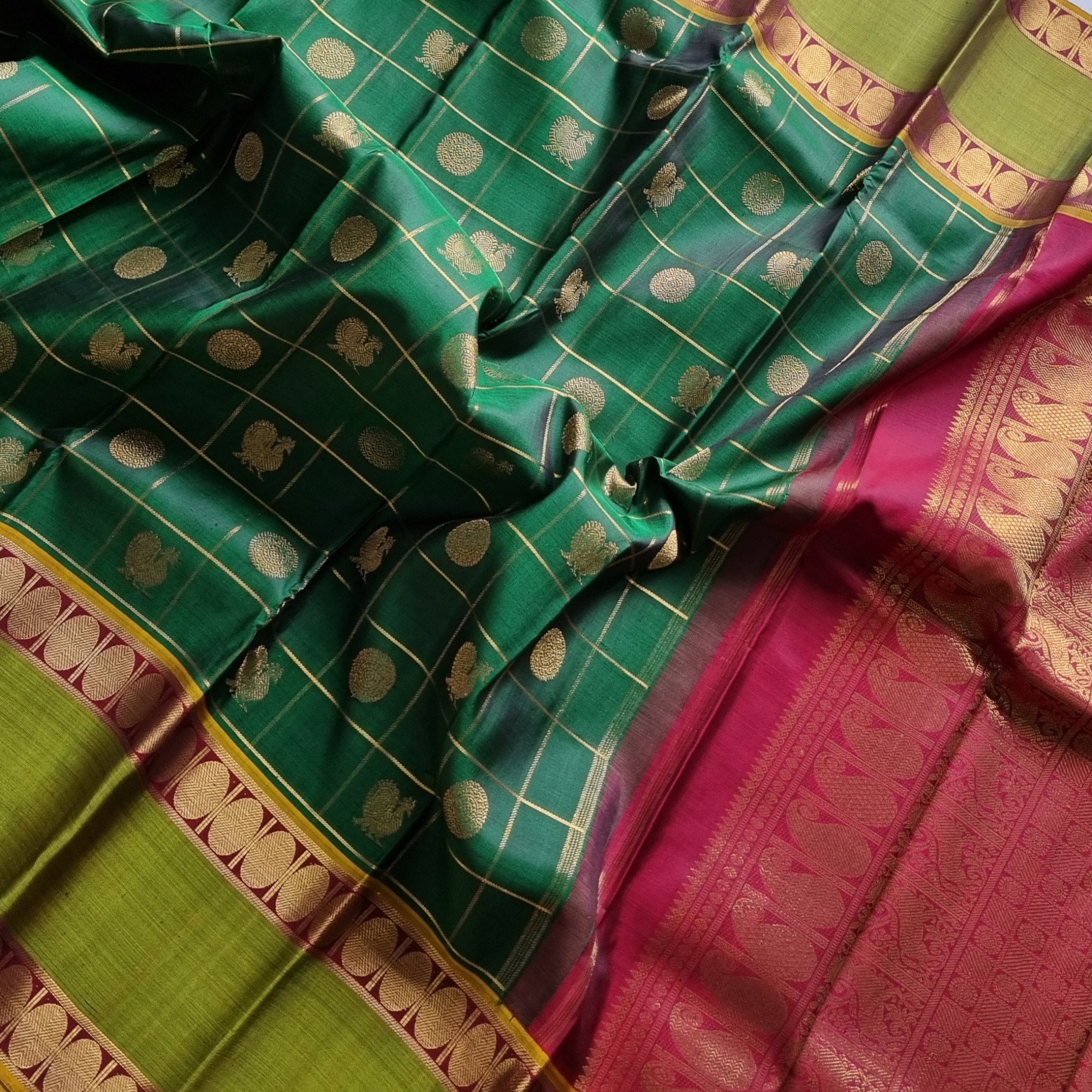 Kanjivaram Silk gorgeous dark green Mayil Chakram