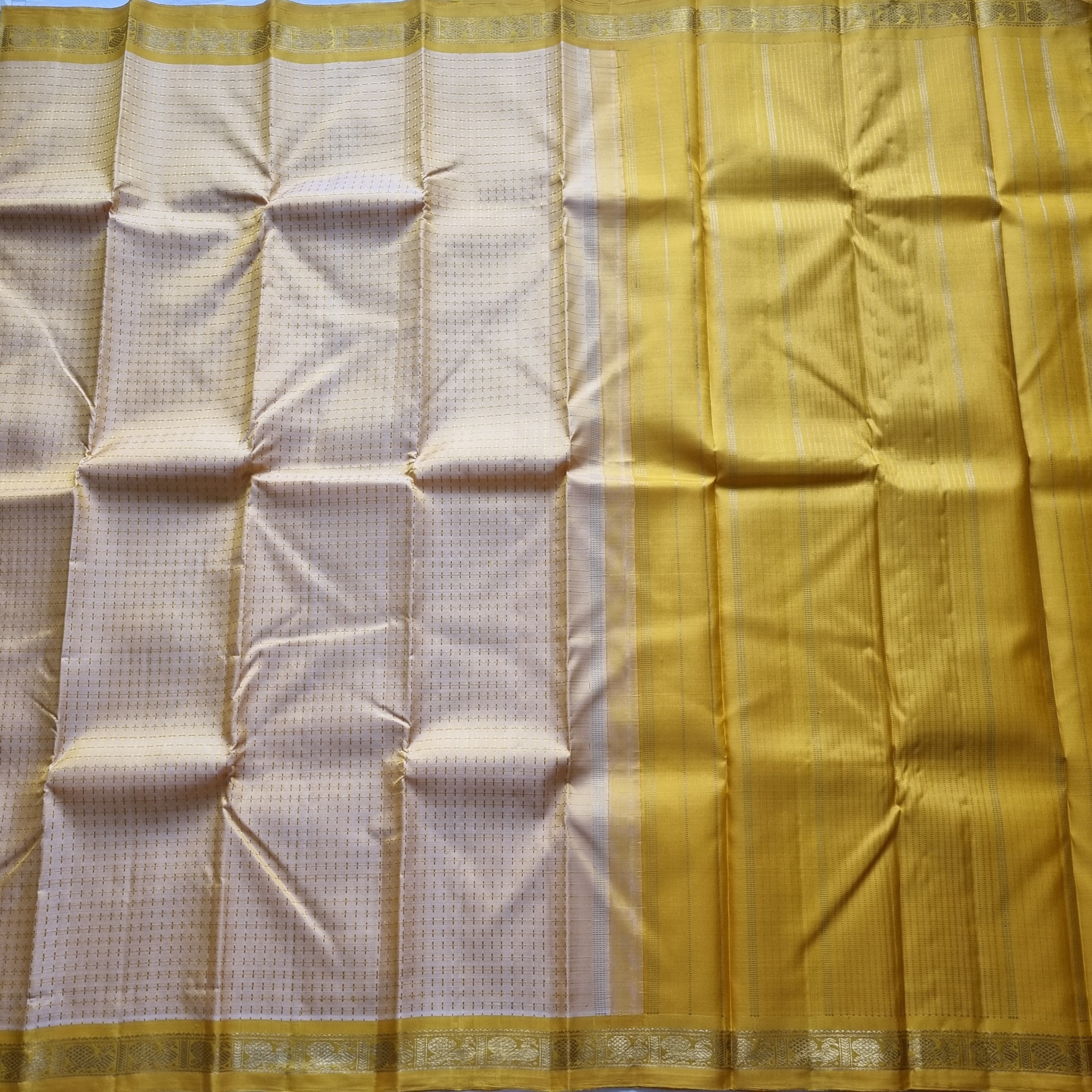 Kanjivaram Silk golden  with plus buttas