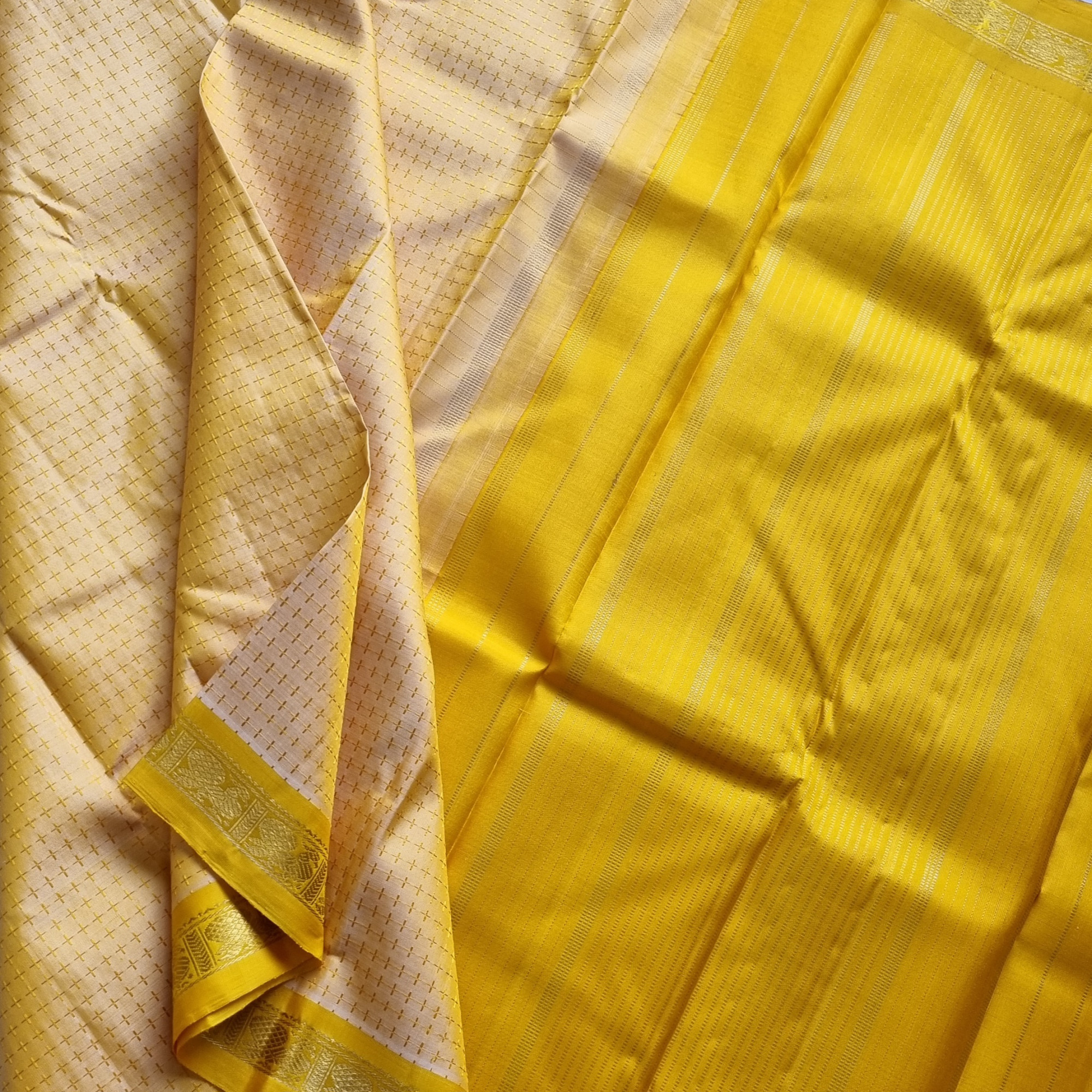Kanjivaram Silk golden  with plus buttas