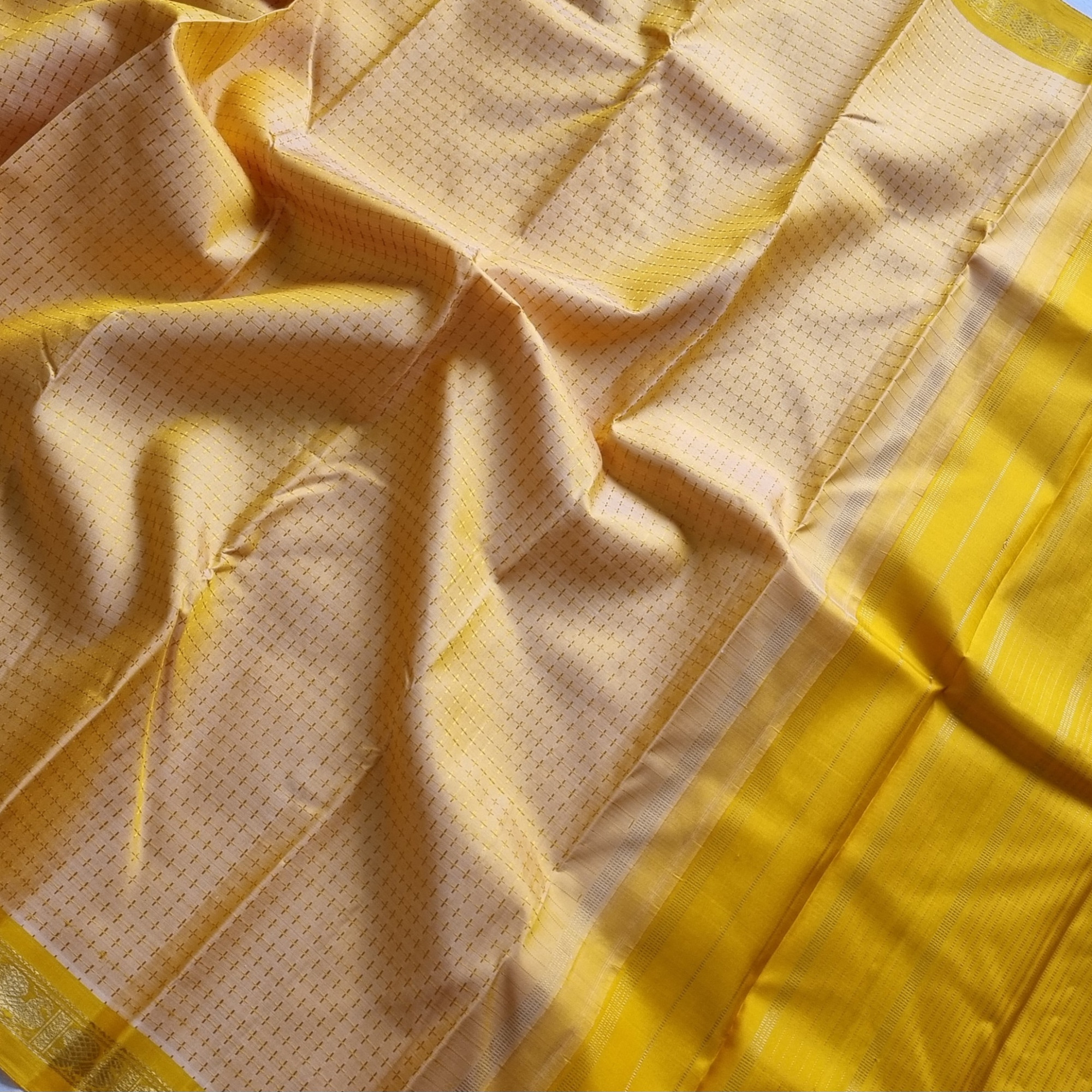 Kanjivaram Silk golden  with plus buttas