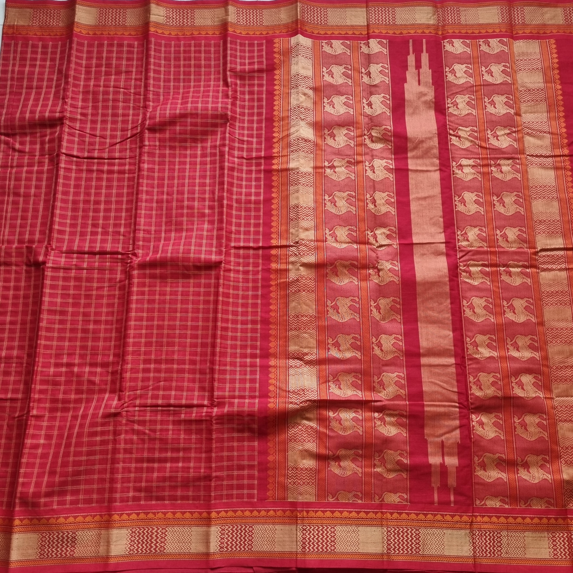 Kanchi Cotton red checked with Yali on pallu