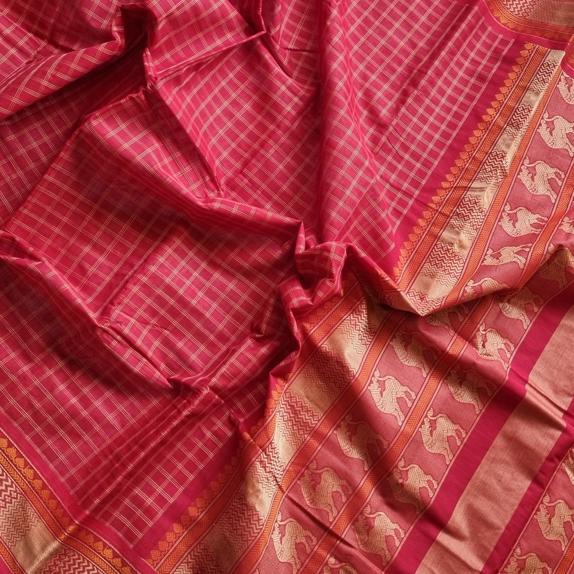 Kanchi Cotton red checked with Yali on pallu
