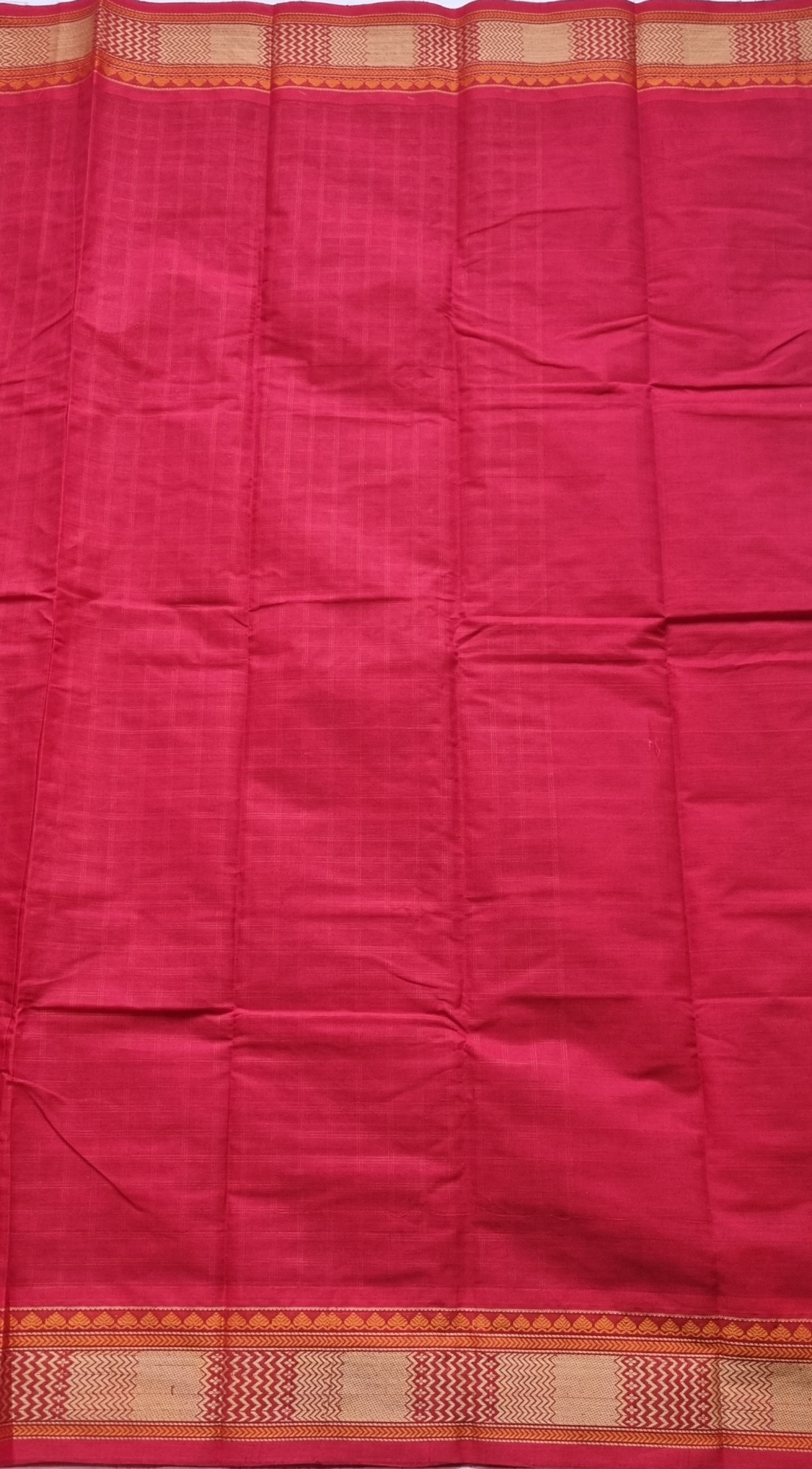 Kanchi Cotton red checked with Yali on pallu