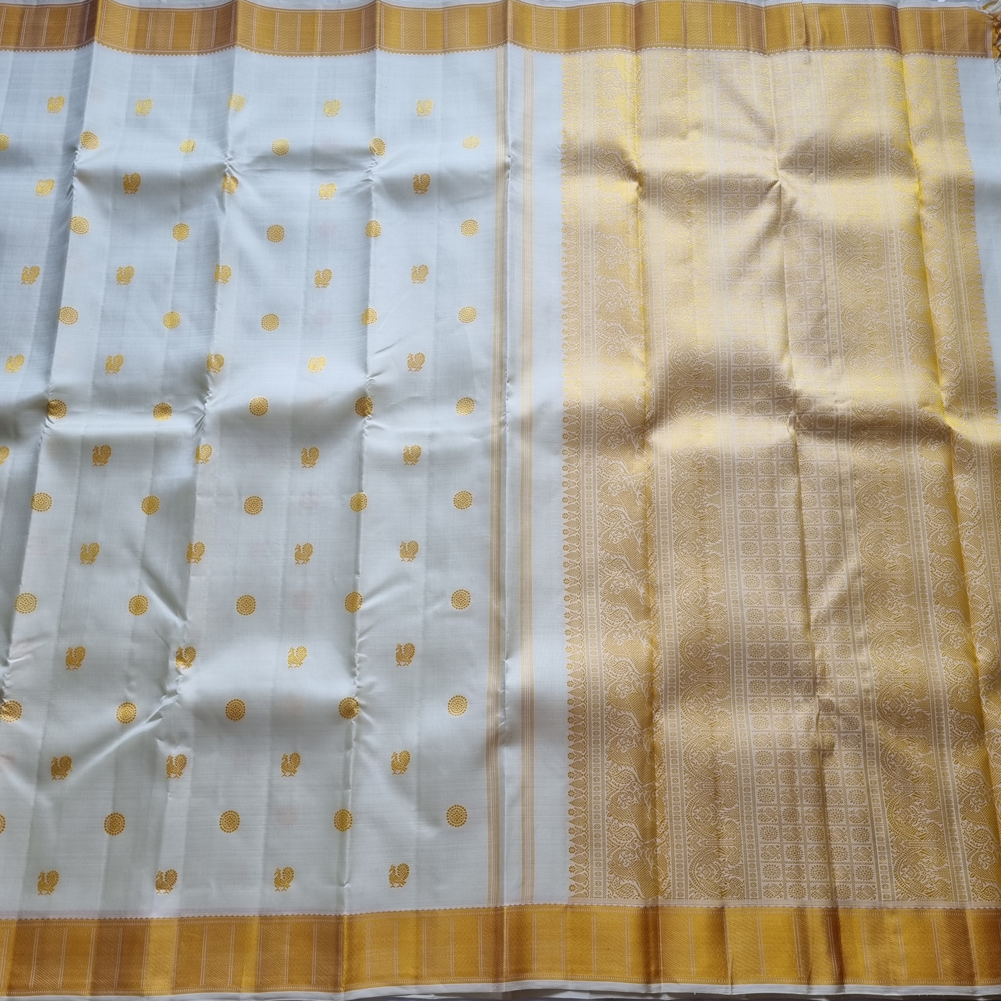 Kanjivaram silk cream threadwork