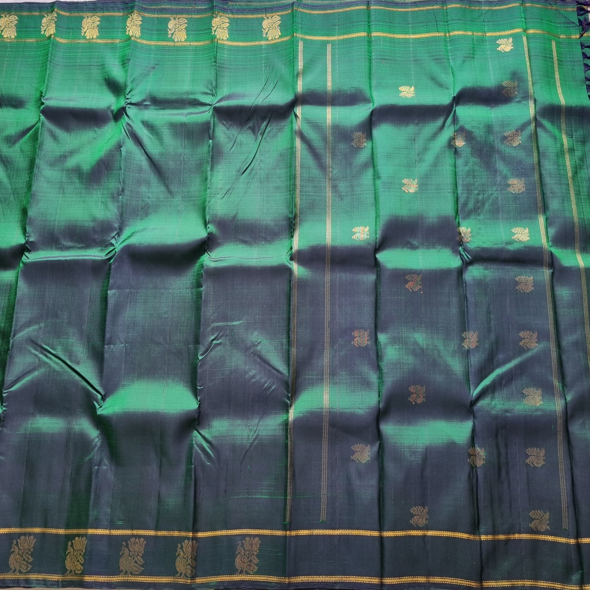 Maragathavalli  Vintage Revival Kanjivaram Silk shot deep emerald green