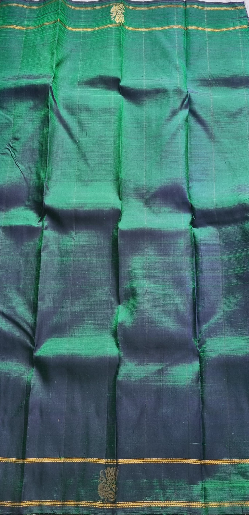 Maragathavalli  Vintage Revival Kanjivaram Silk shot deep emerald green