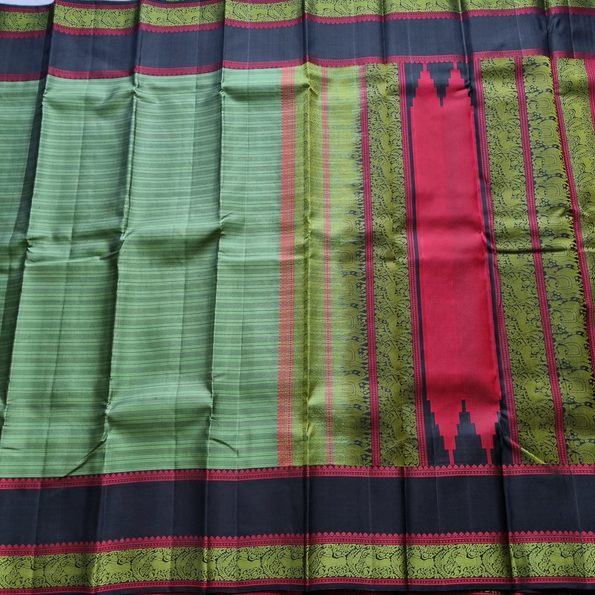 Olive green threadwork Kanjivaram silk saree