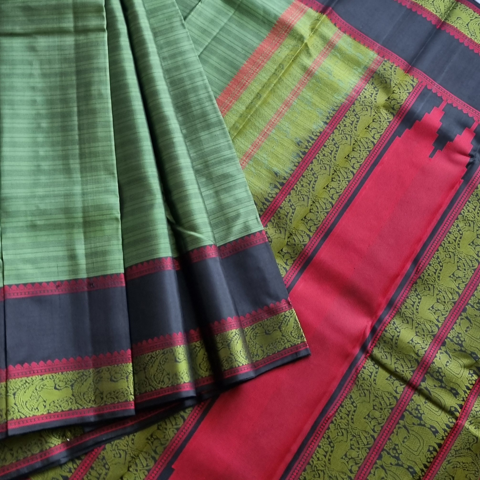 Olive green threadwork Kanjivaram silk saree