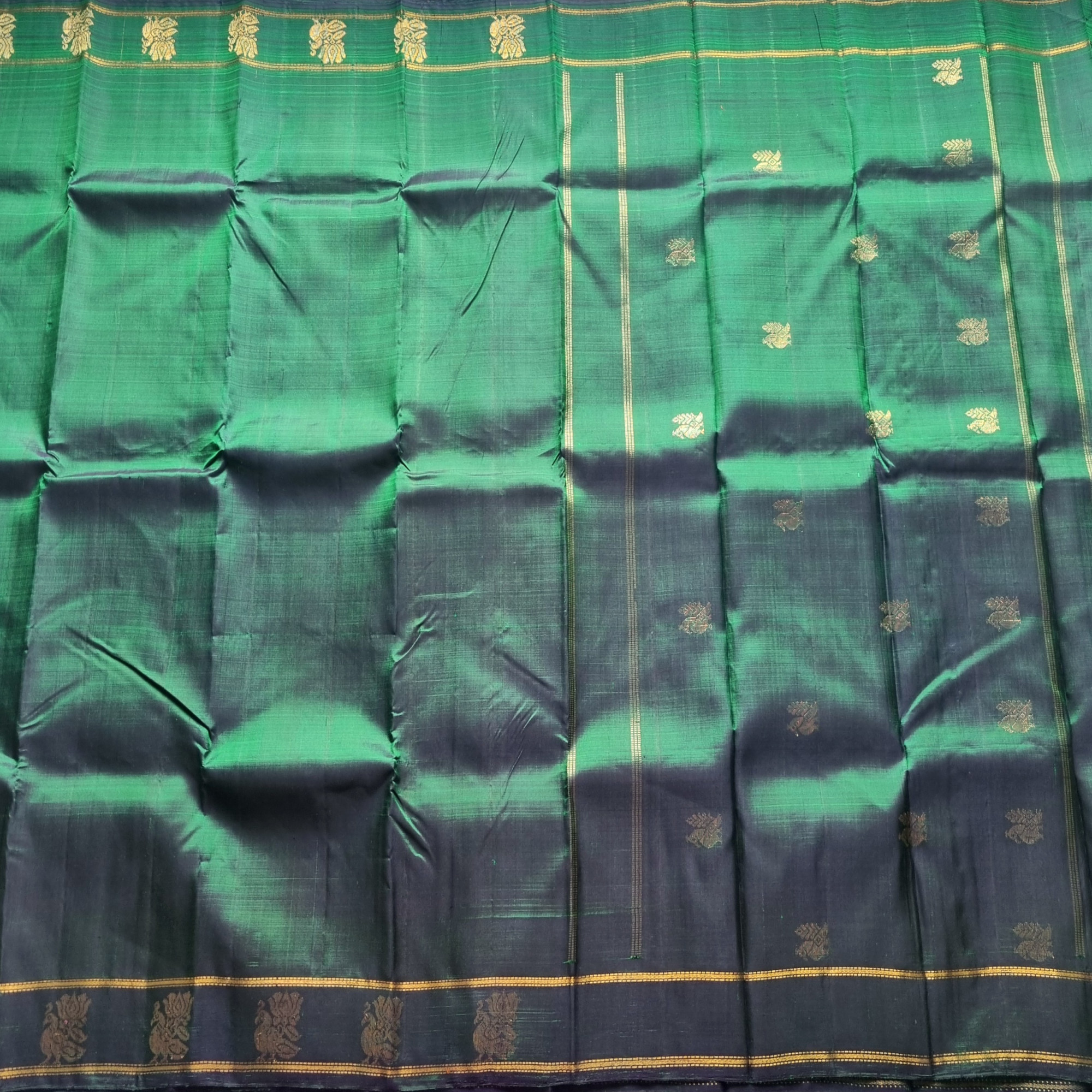 Maragathavalli  Vintage Revival Kanjivaram Silk shot deep emerald green