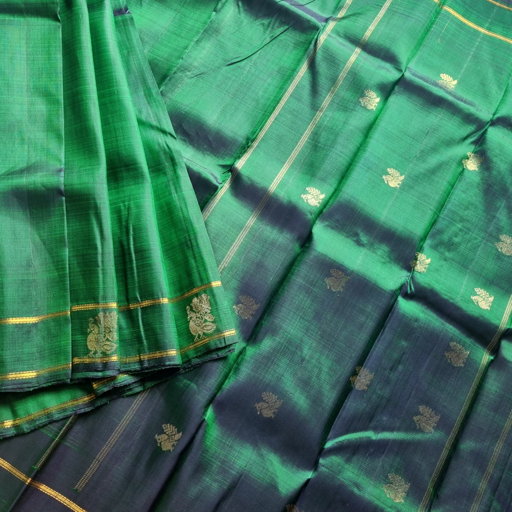 Image of Maragathavalli : Vintage Revival Kanjivaram Silk shot deep emerald green