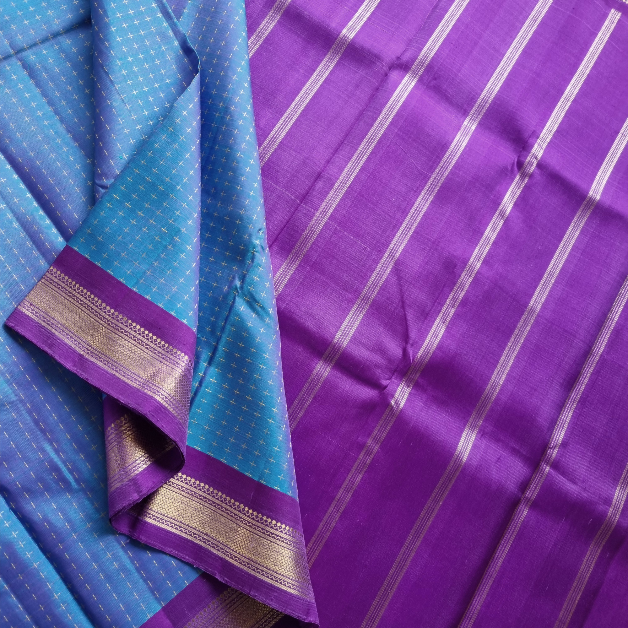 Kanjivaram Silk shot blue with plus buttas