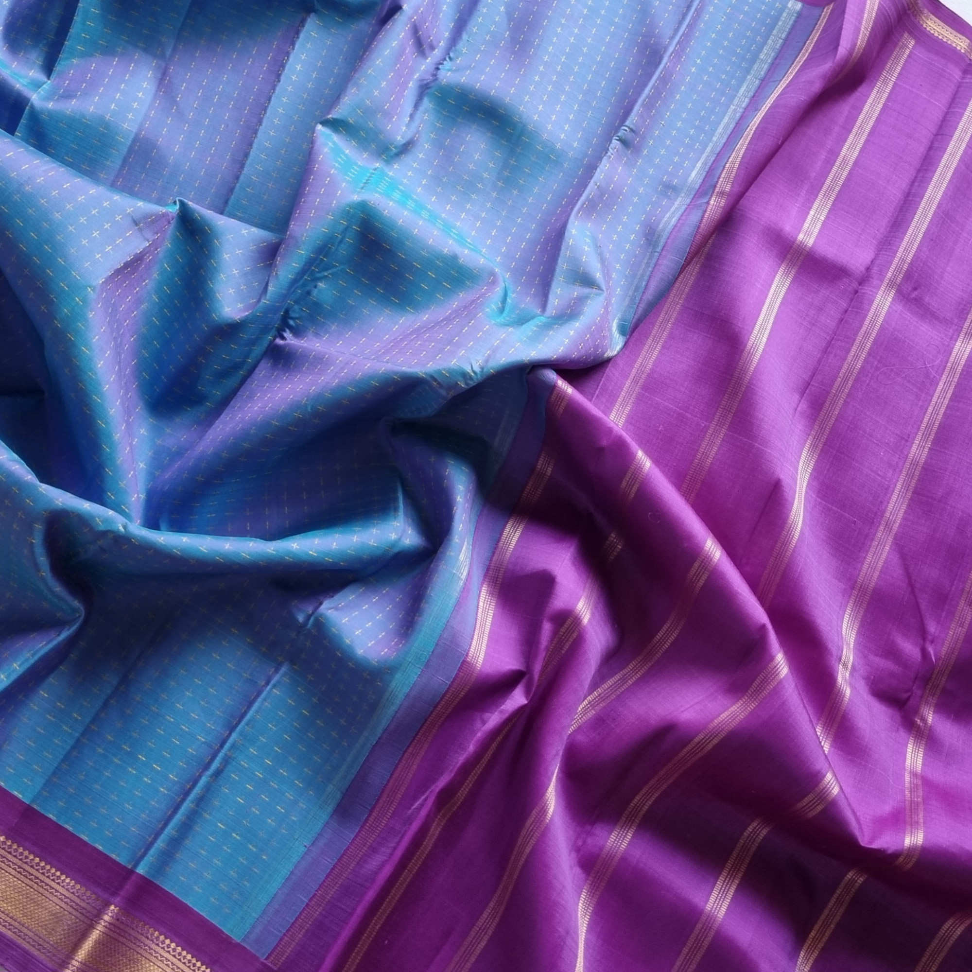 Kanjivaram Silk shot blue with plus buttas