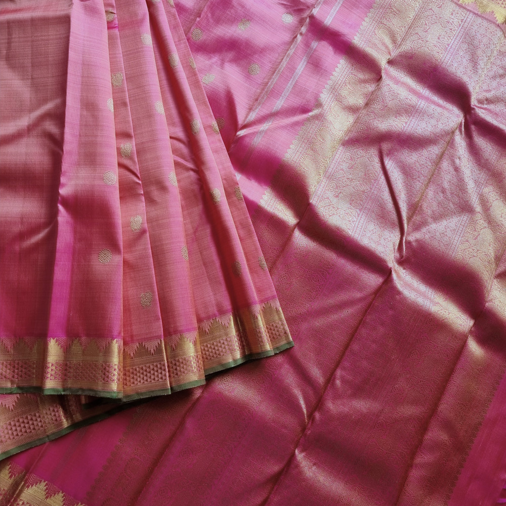Image of Kanjivaram silk saree shot pink Mayil chakram and arai madam borders