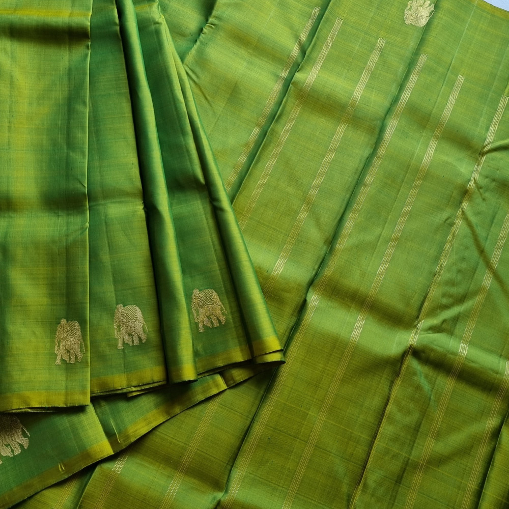 Image of Kanjivaram Silk shot green with elephant buttas