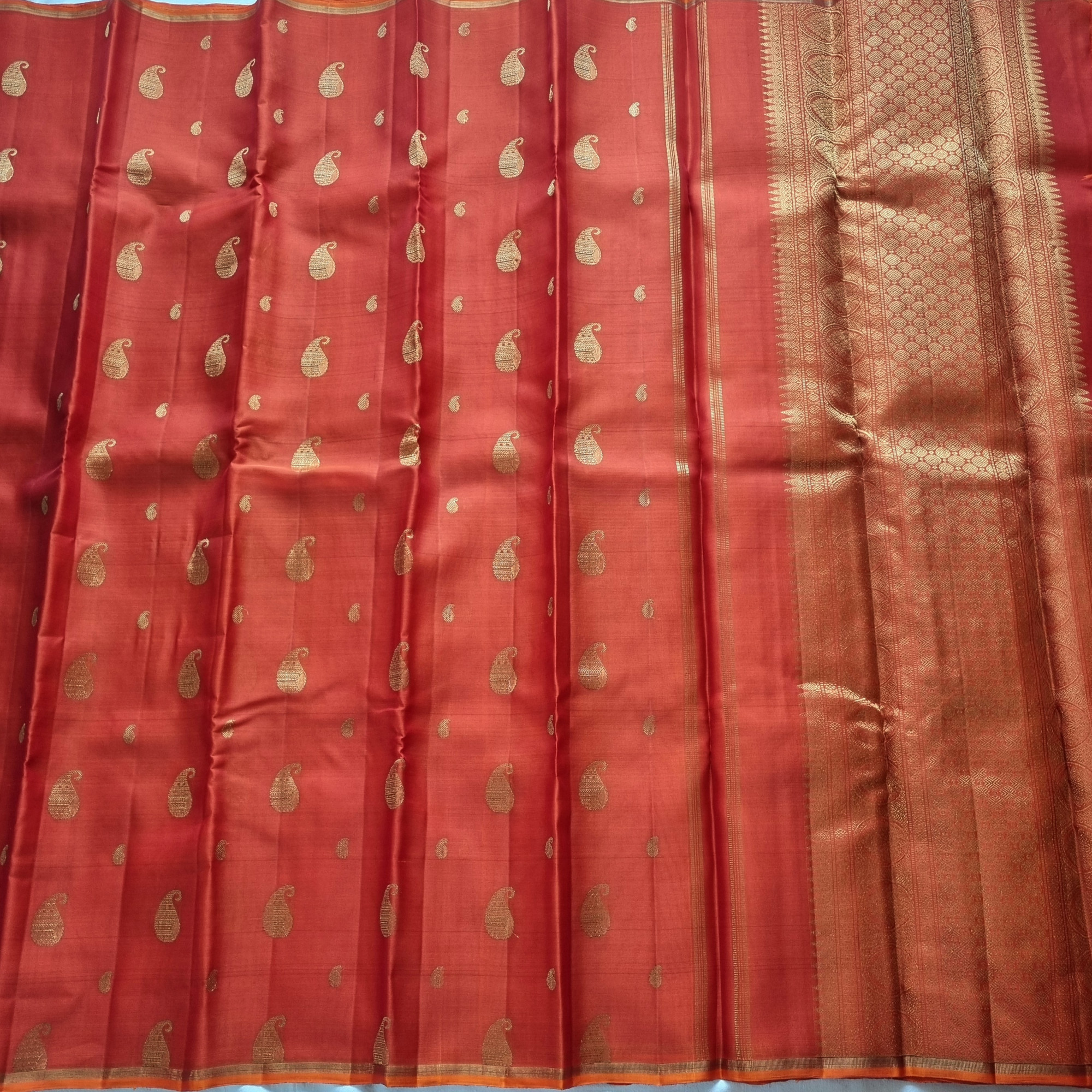 Organza Kanjivaram orange with paisley buttas