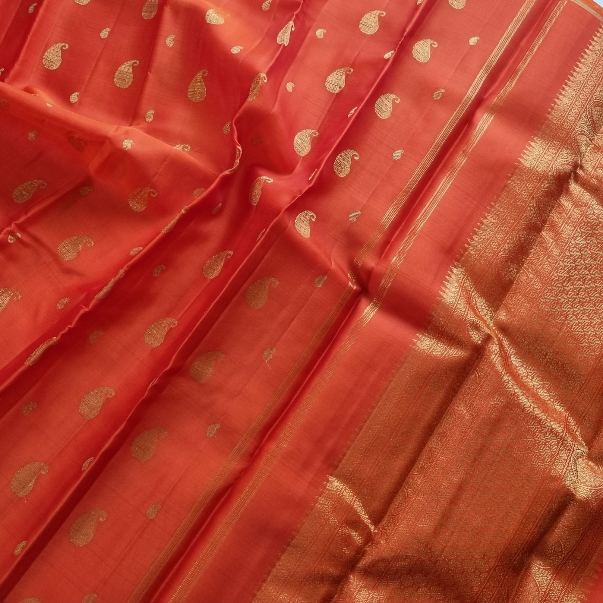 Organza Kanjivaram orange with paisley buttas