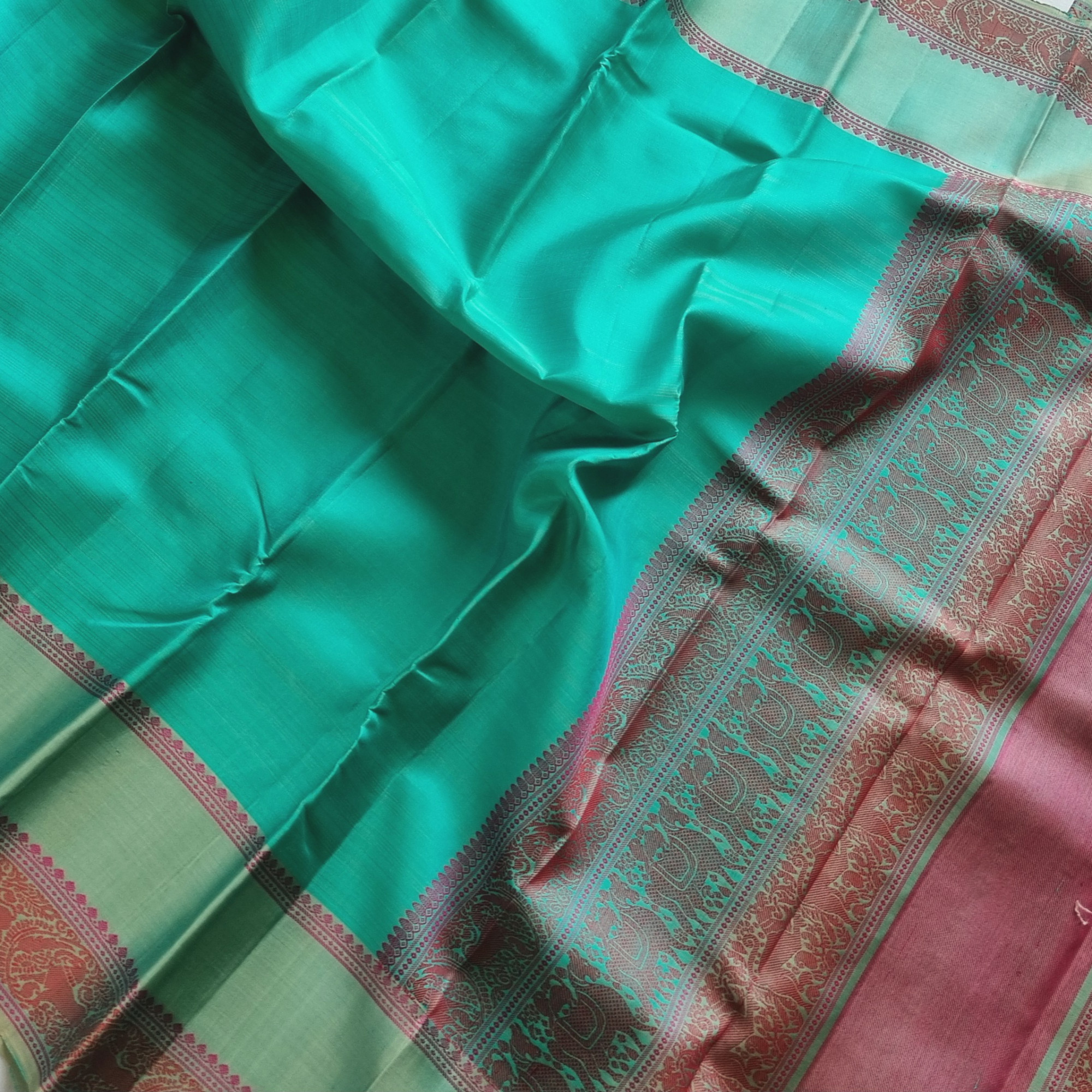 Kanjivaram Silk sea green threadwork