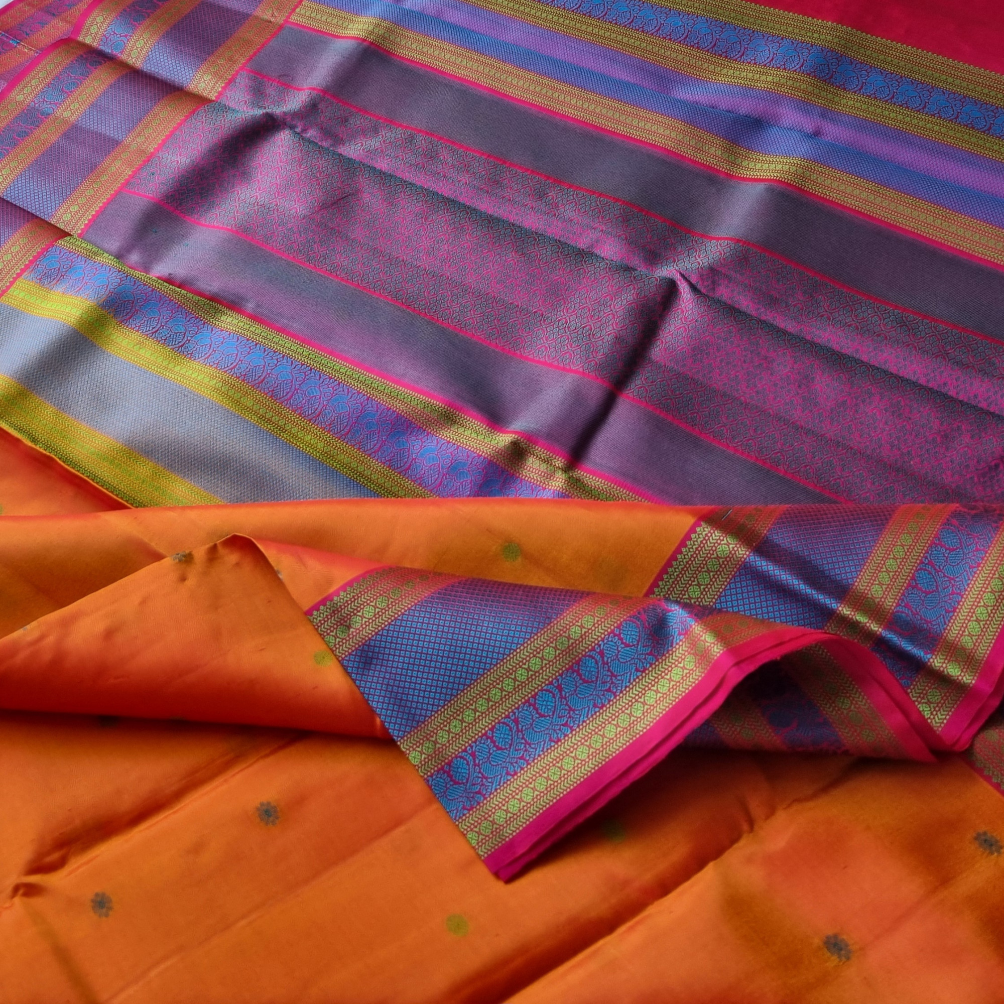 Kanjivaram Silk shot orange threadwork