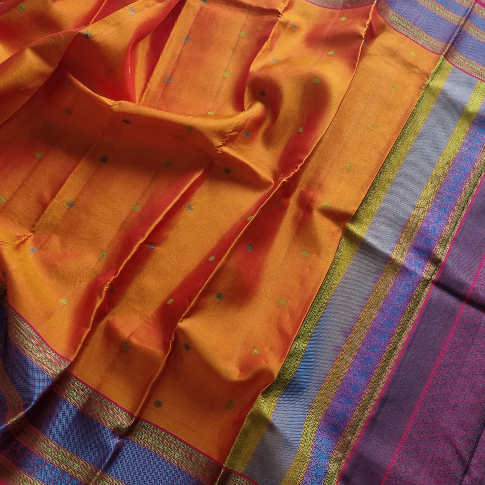 Kanjivaram Silk shot orange threadwork