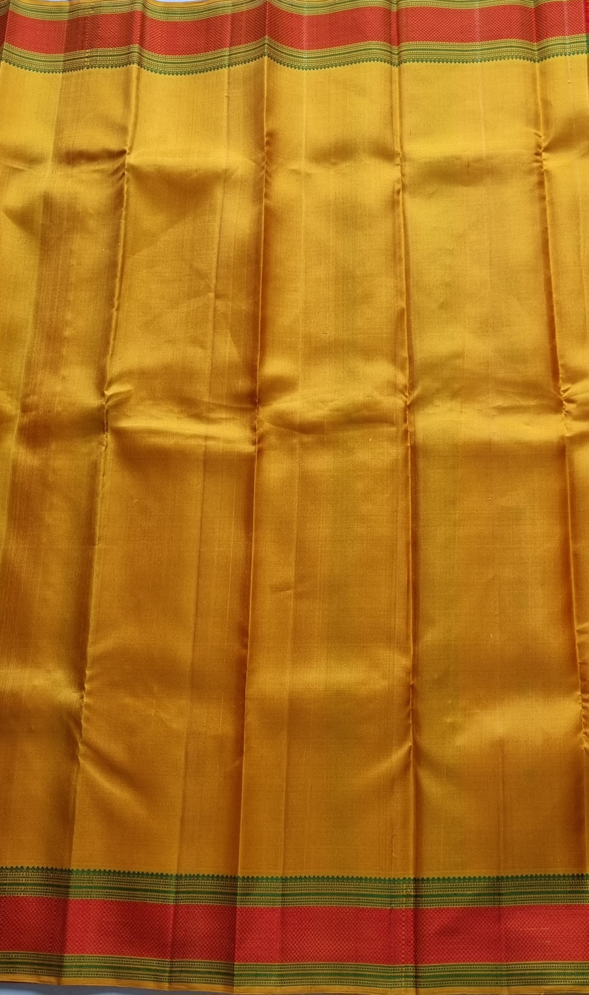 Kanjivaram Silk shot orange threadwork