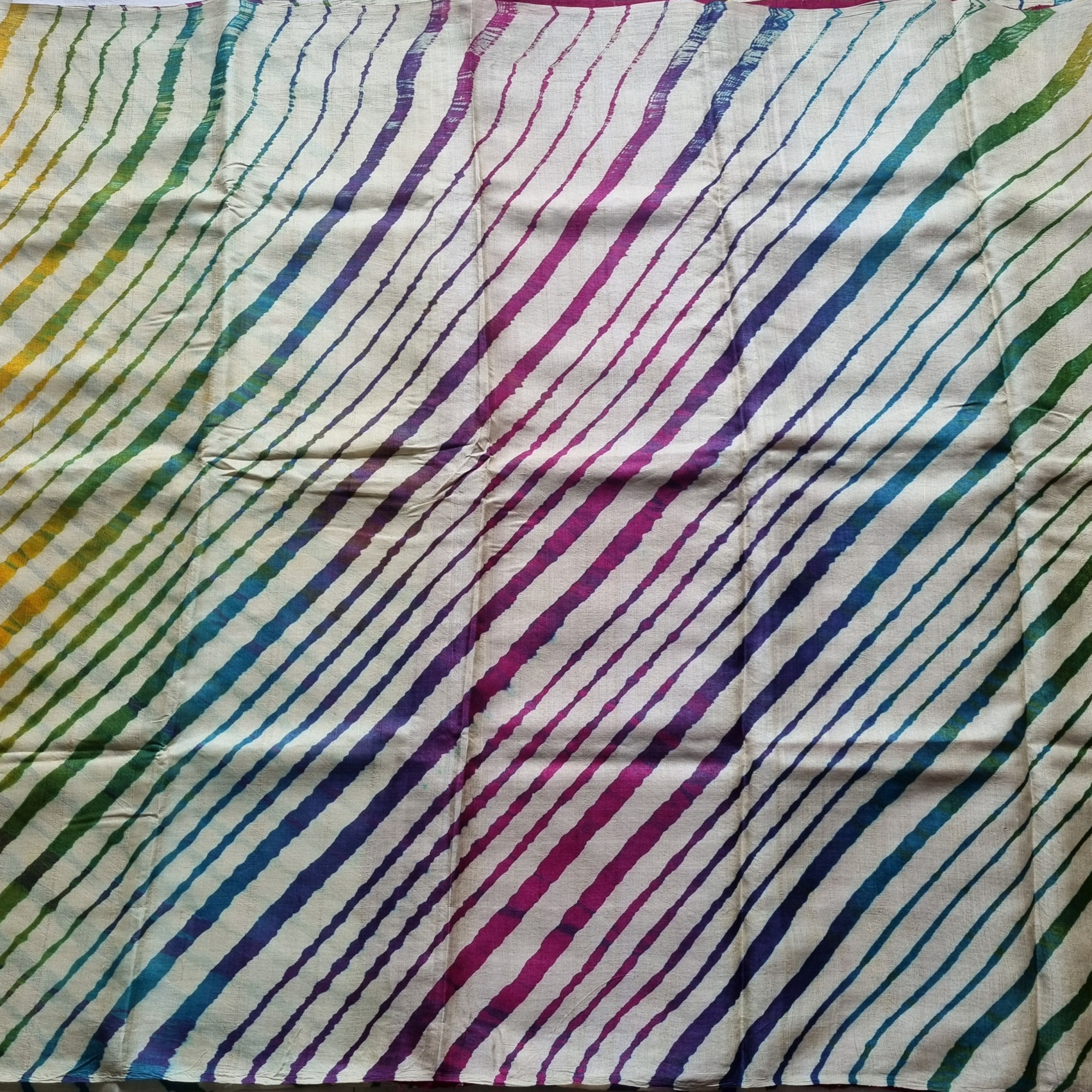 Handcrafted tasar Lehariya saree ivory with multi color