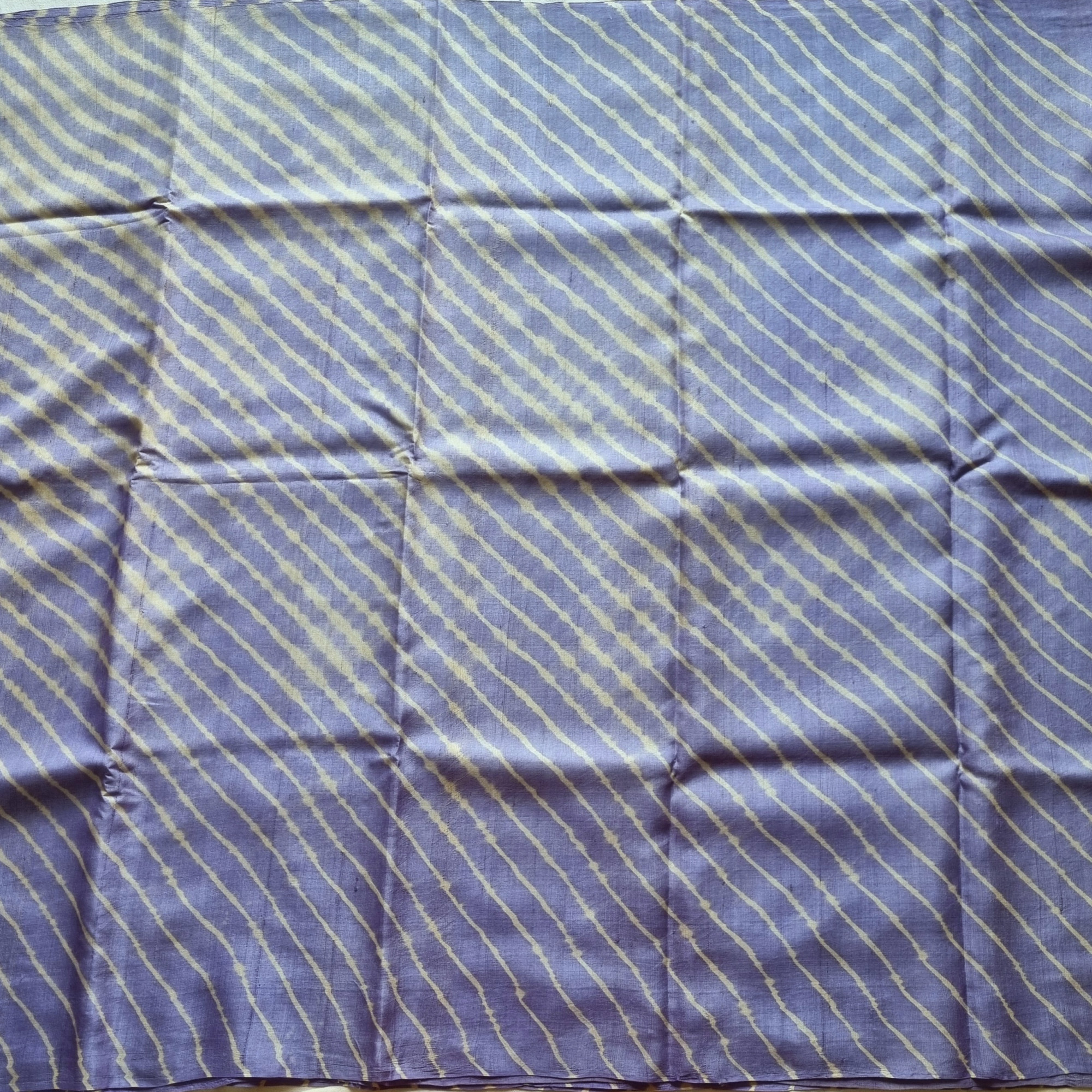 Handcrafted Lehariya on tussar periwinkle