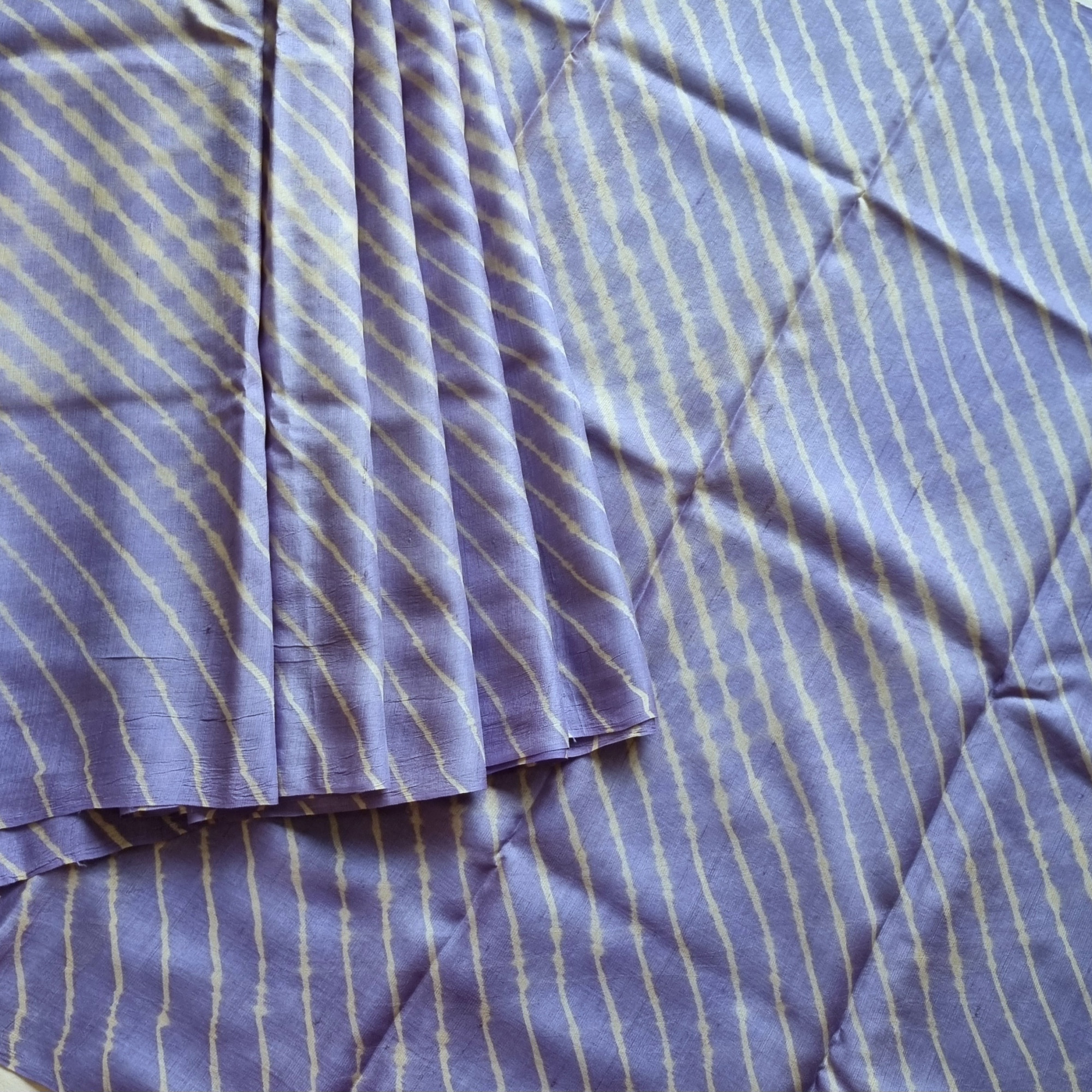 Handcrafted Lehariya on tussar periwinkle