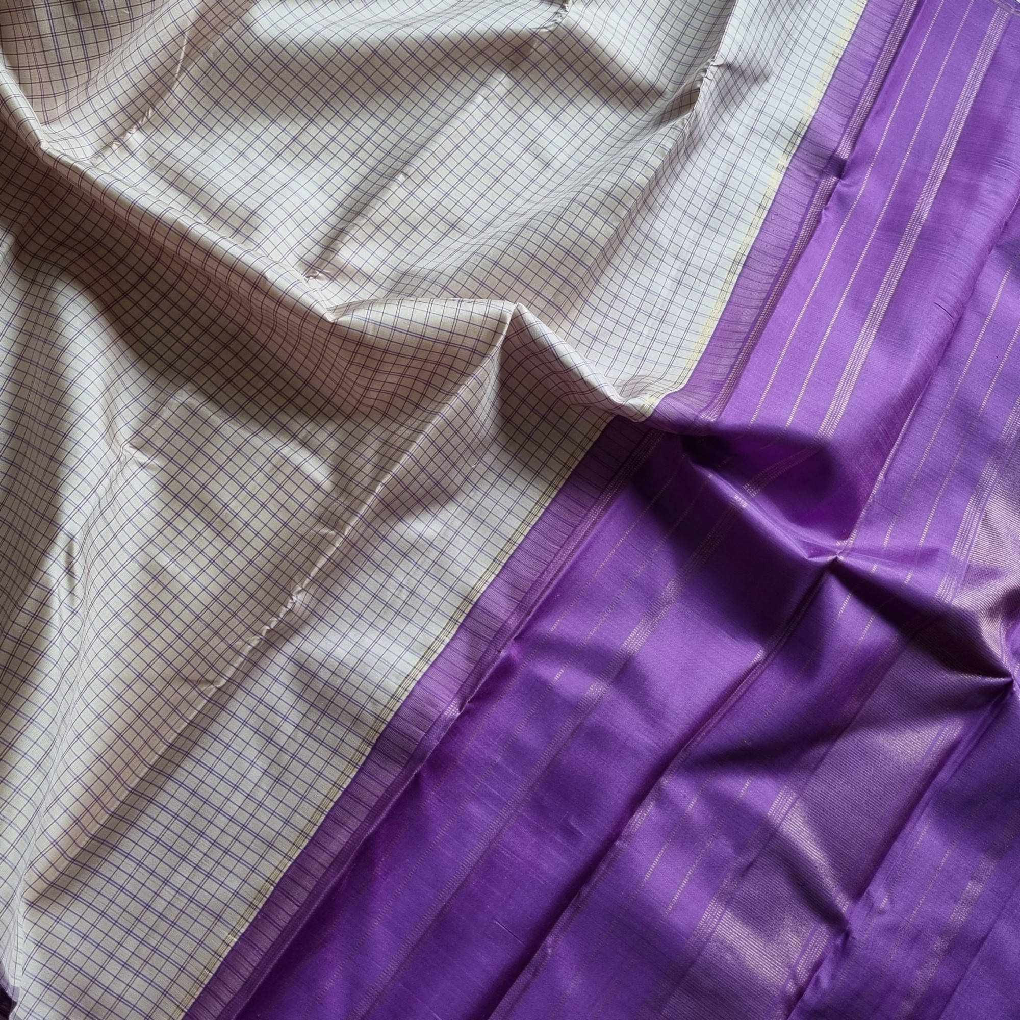 Kanjivaram Silk offwhite grids with purple pallu