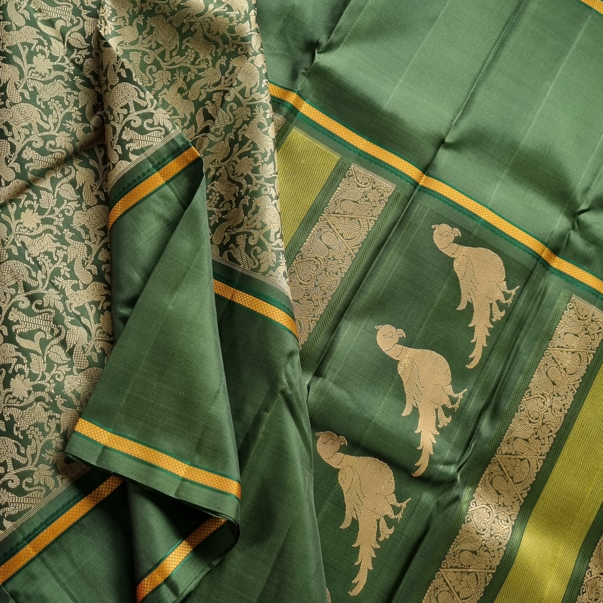 Kanjivaram silk Vanasingaram green threadwork