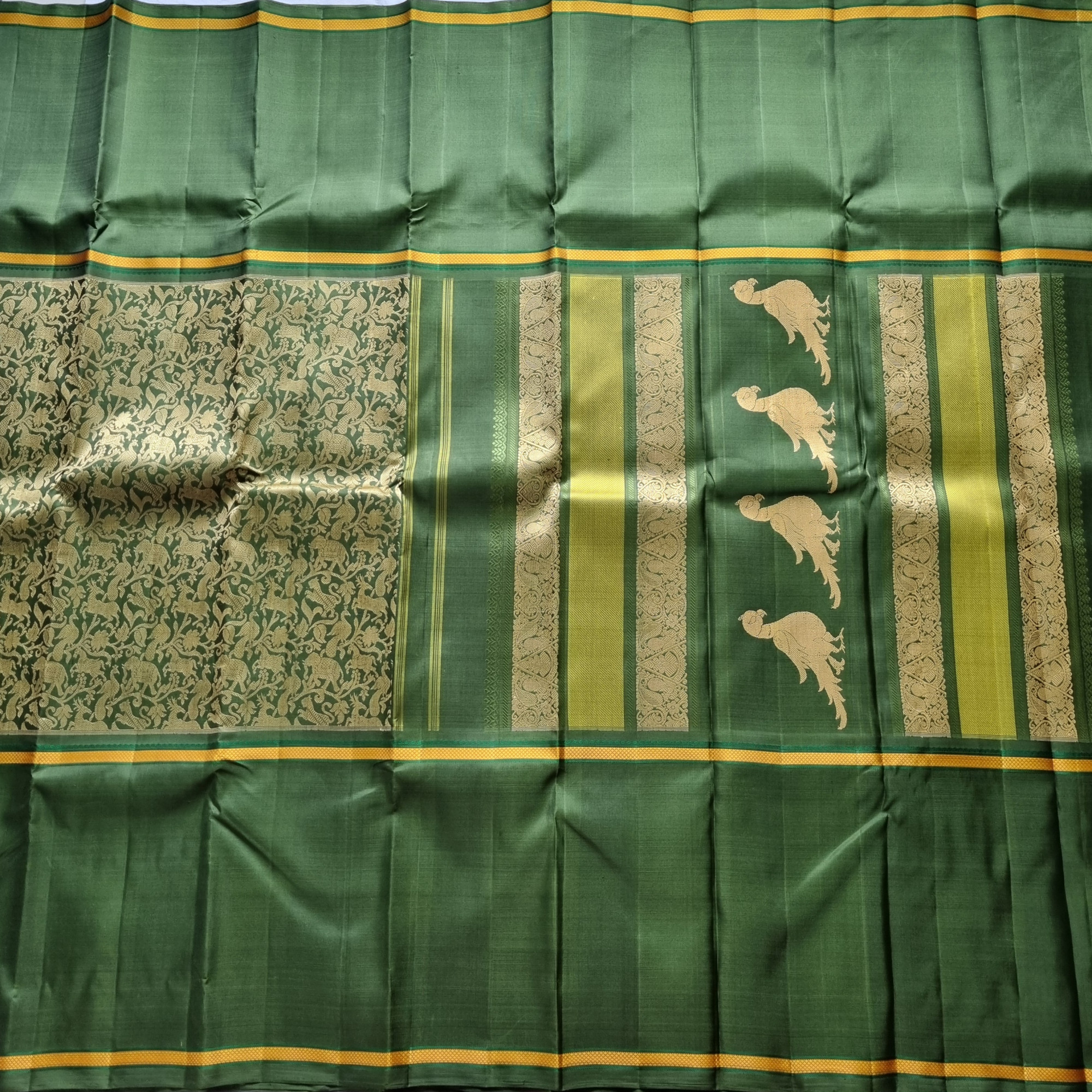 Kanjivaram silk Vanasingaram green threadwork