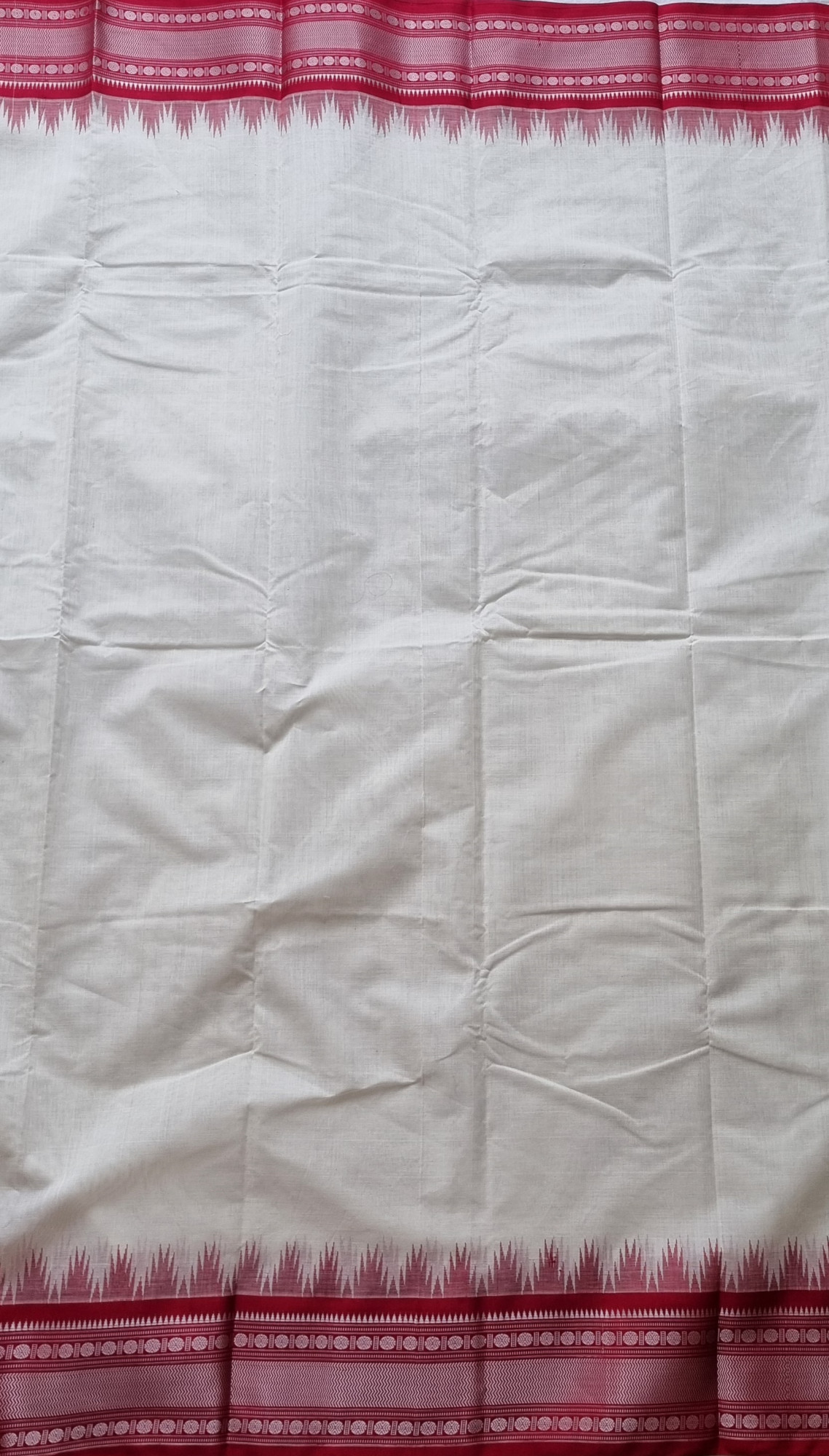 Kanchi Cotton body offwhite with red Korvai Silk Borders