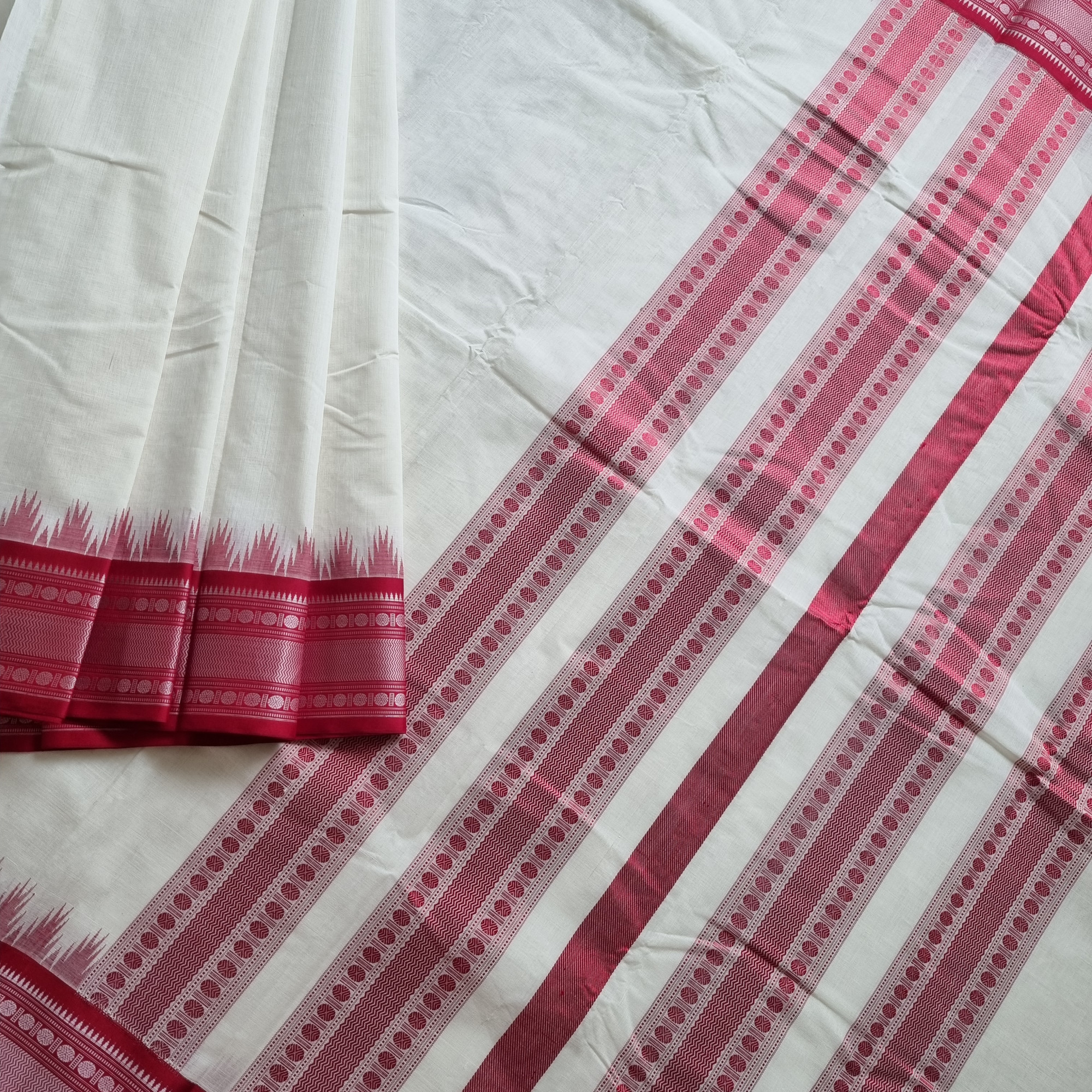 Kanchi Cotton body offwhite with red Korvai Silk Borders