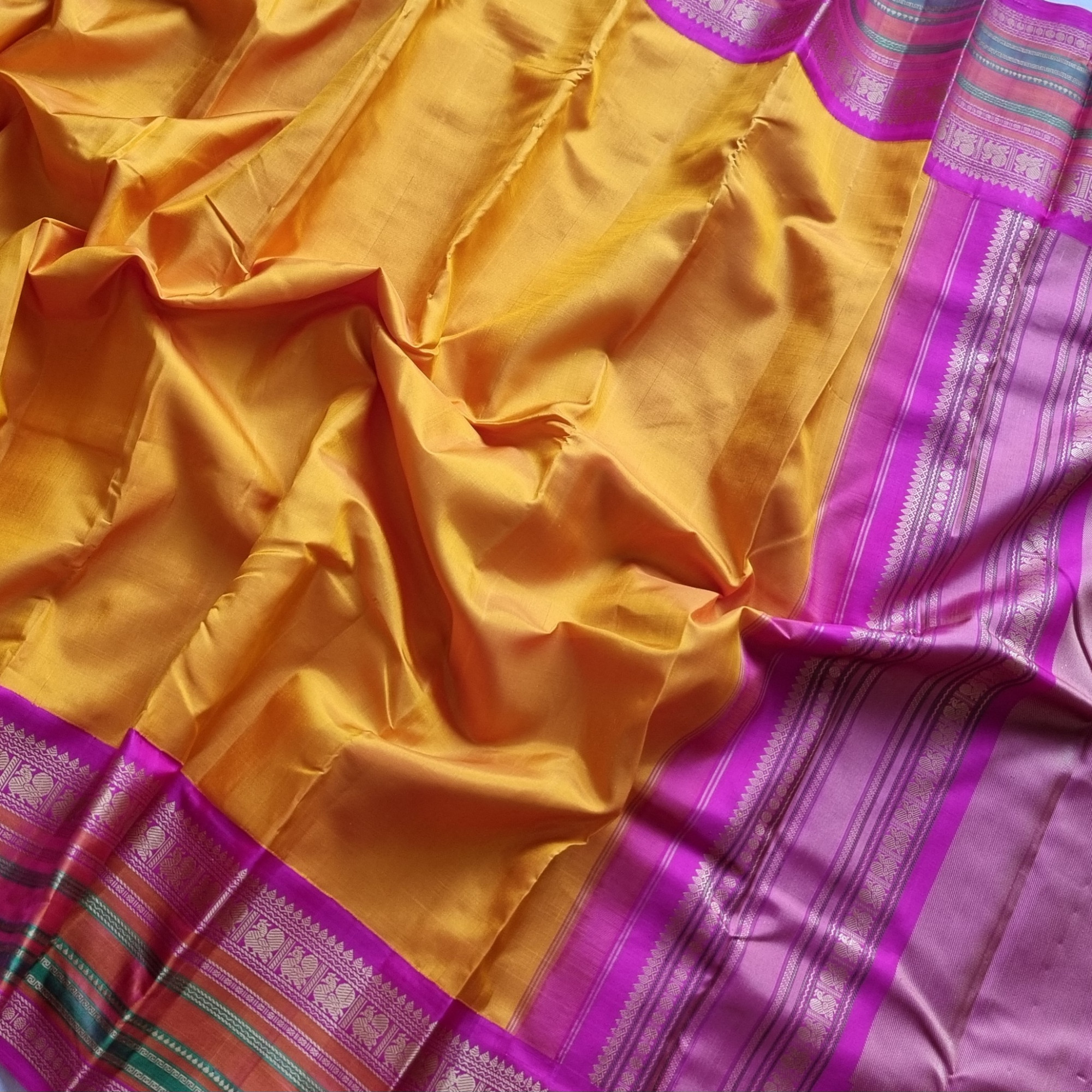 Kanjivaram Silk  festive yellow and pink Korvai threadwork