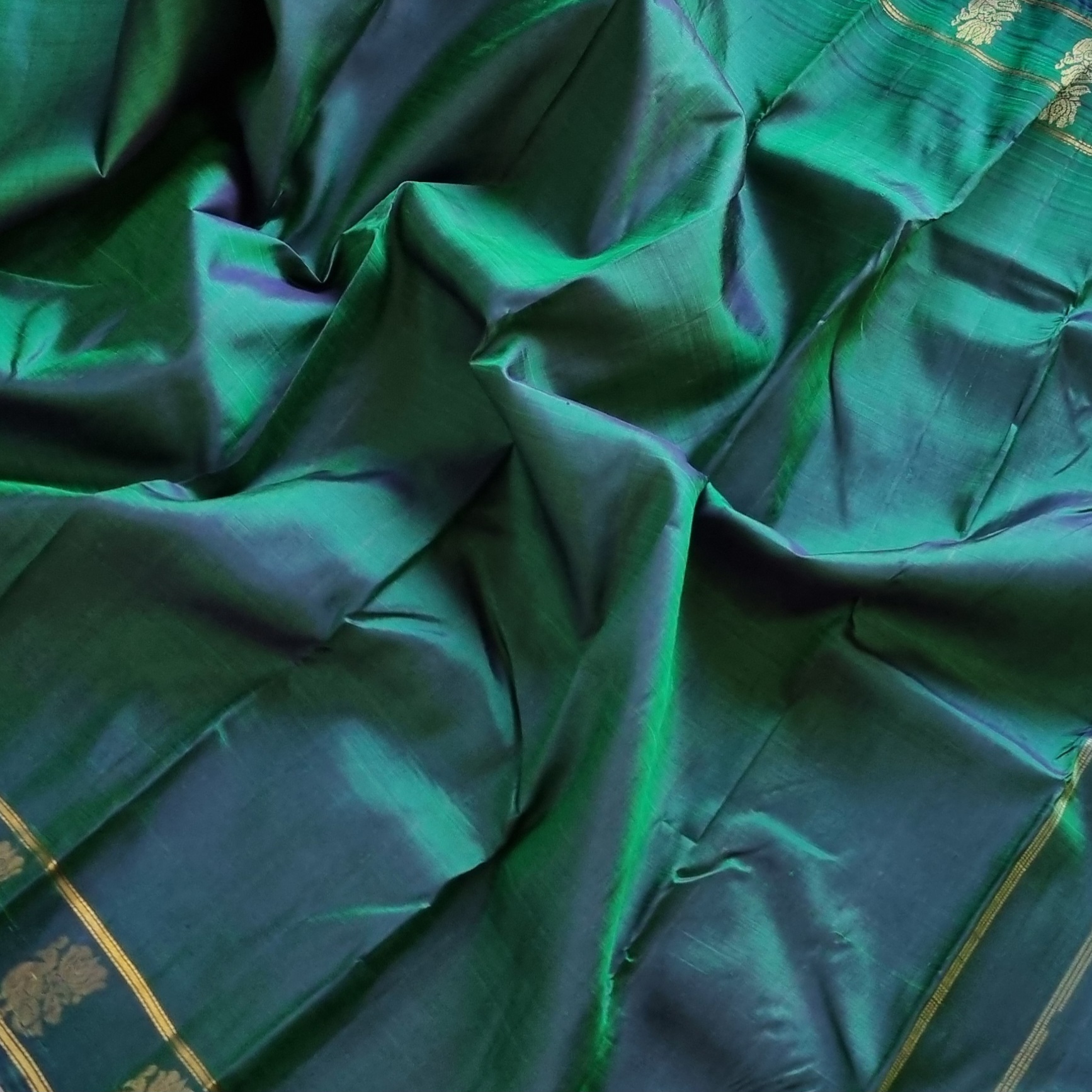 Maragathavalli  Vintage Revival Kanjivaram Silk shot deep emerald green