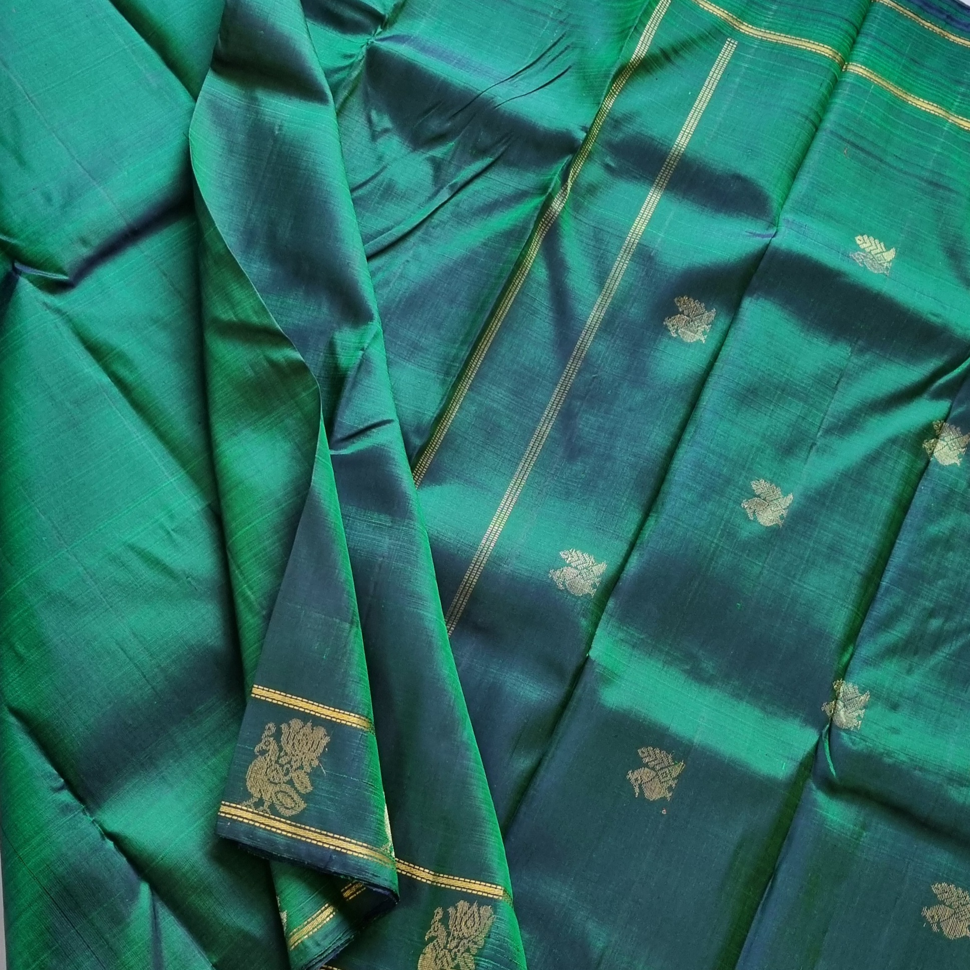 Maragathavalli  Vintage Revival Kanjivaram Silk shot deep emerald green