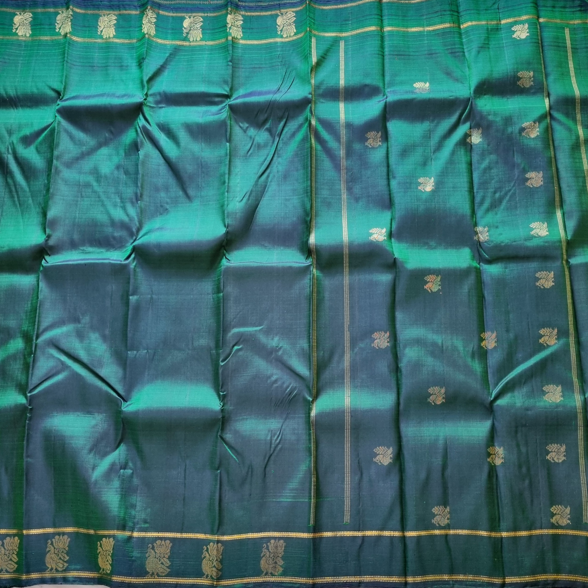Maragathavalli  Vintage Revival Kanjivaram Silk shot deep emerald green