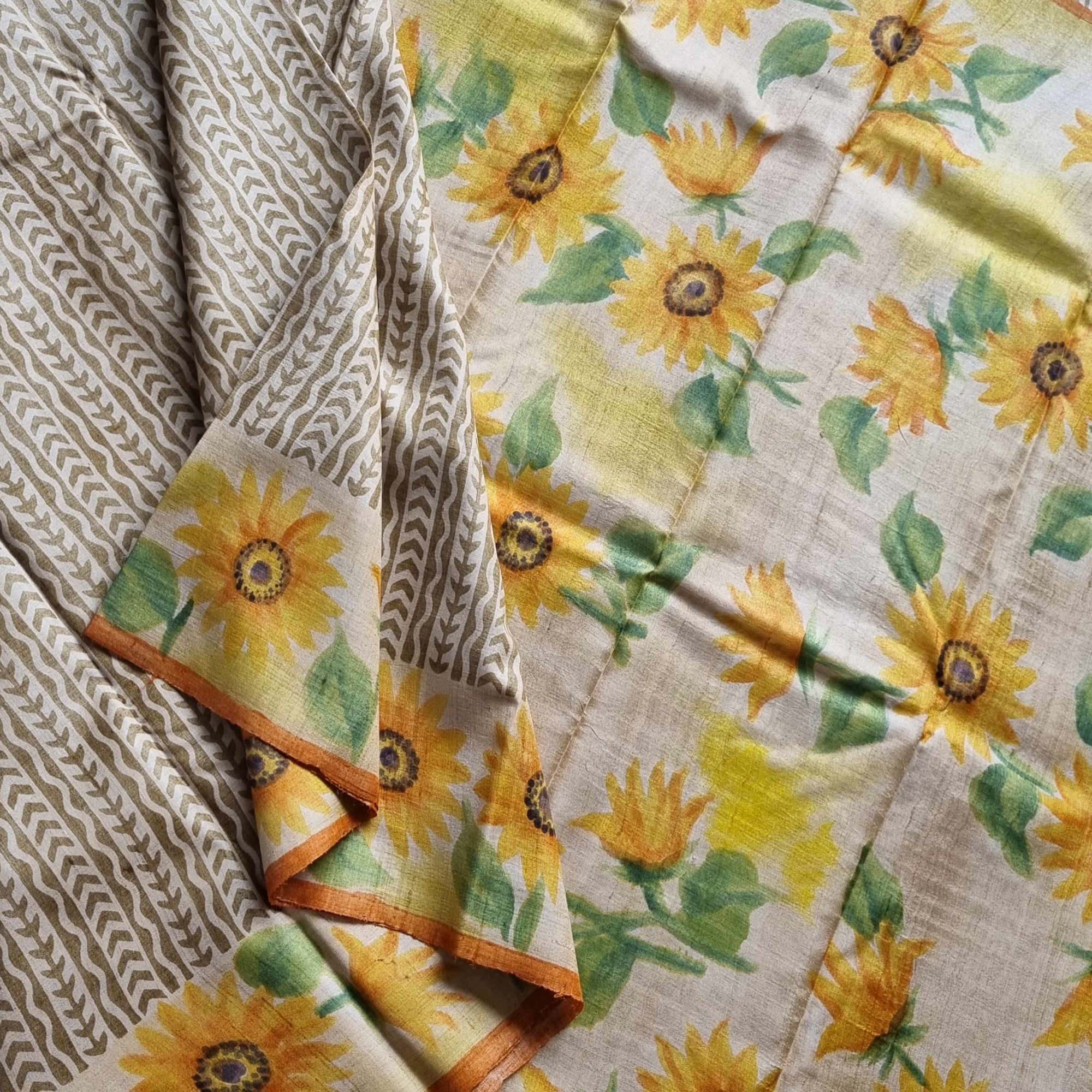 Tussar block printed with handpainted sunflowers on borders and pallu