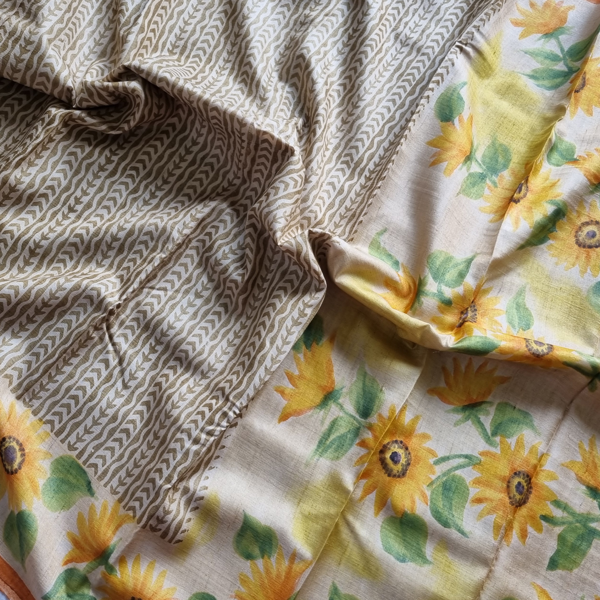 Tussar block printed with handpainted sunflowers on borders and pallu