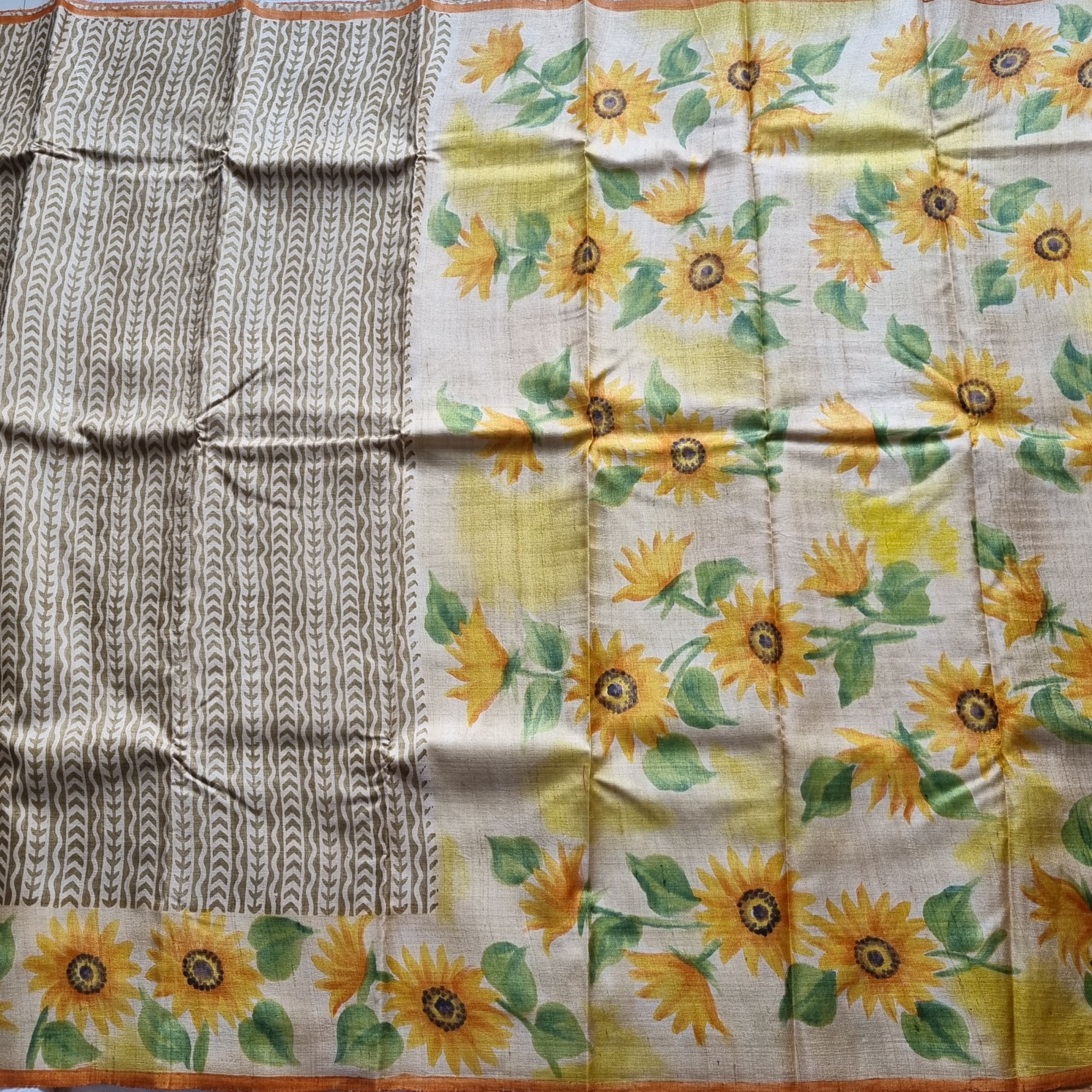 Tussar block printed with handpainted sunflowers on borders and pallu